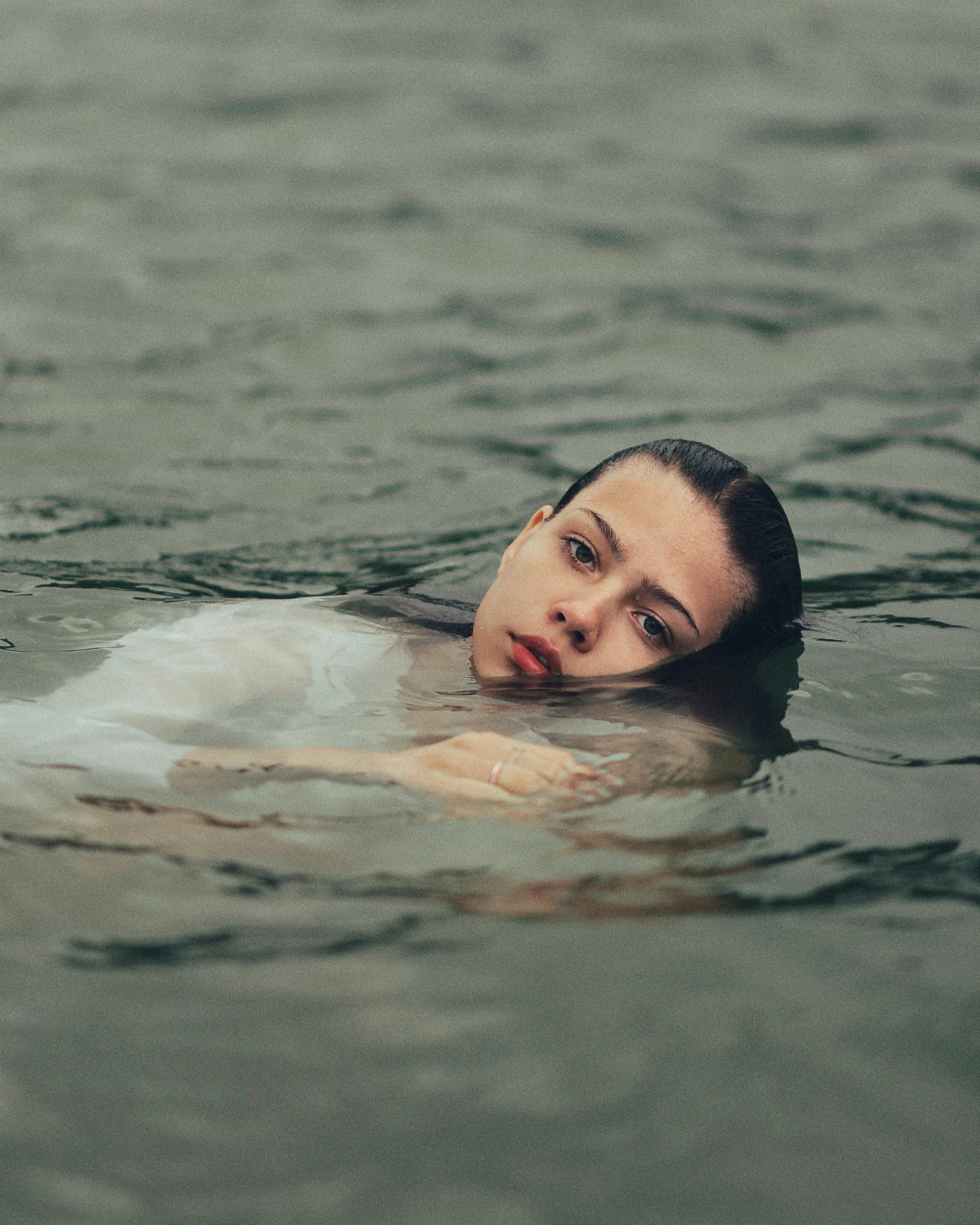 3296x4119 Woman Floating in Water · Free