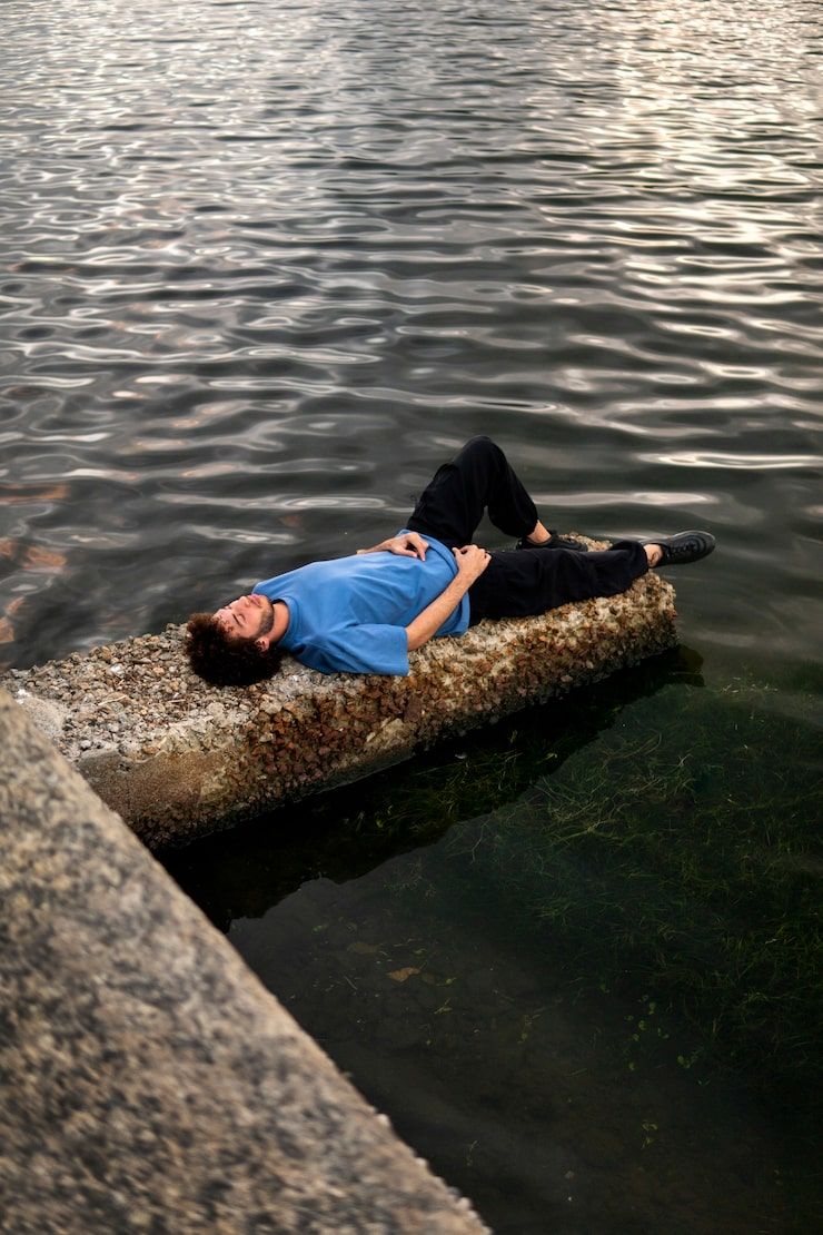 740x1110 Floating On Calm Water Photo Free High Quality Picture