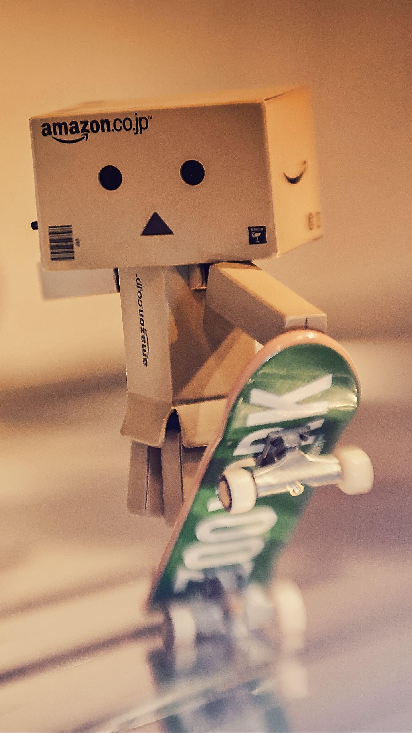 1440x2560 Download wallpaper 1440x2560 danbo, cardboard robot, skateboard