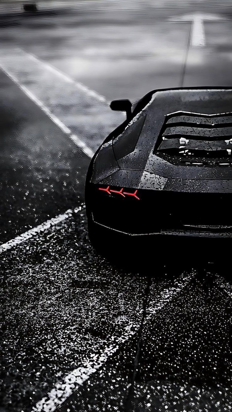 740x1316 Black sports car wallpaper Image