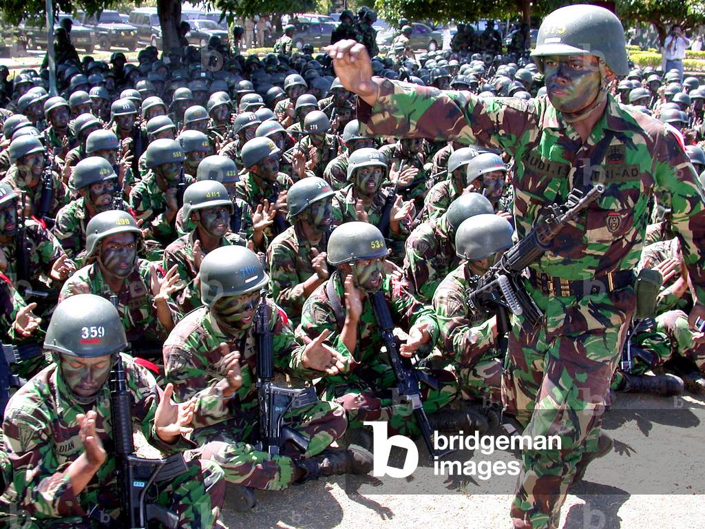 1024x768 Image of CAMOUFLAGED INDONESIAN SOLDIERS PARTICIPATE THE OPENING OF THEIR TRAINING IN BANYUWANGI