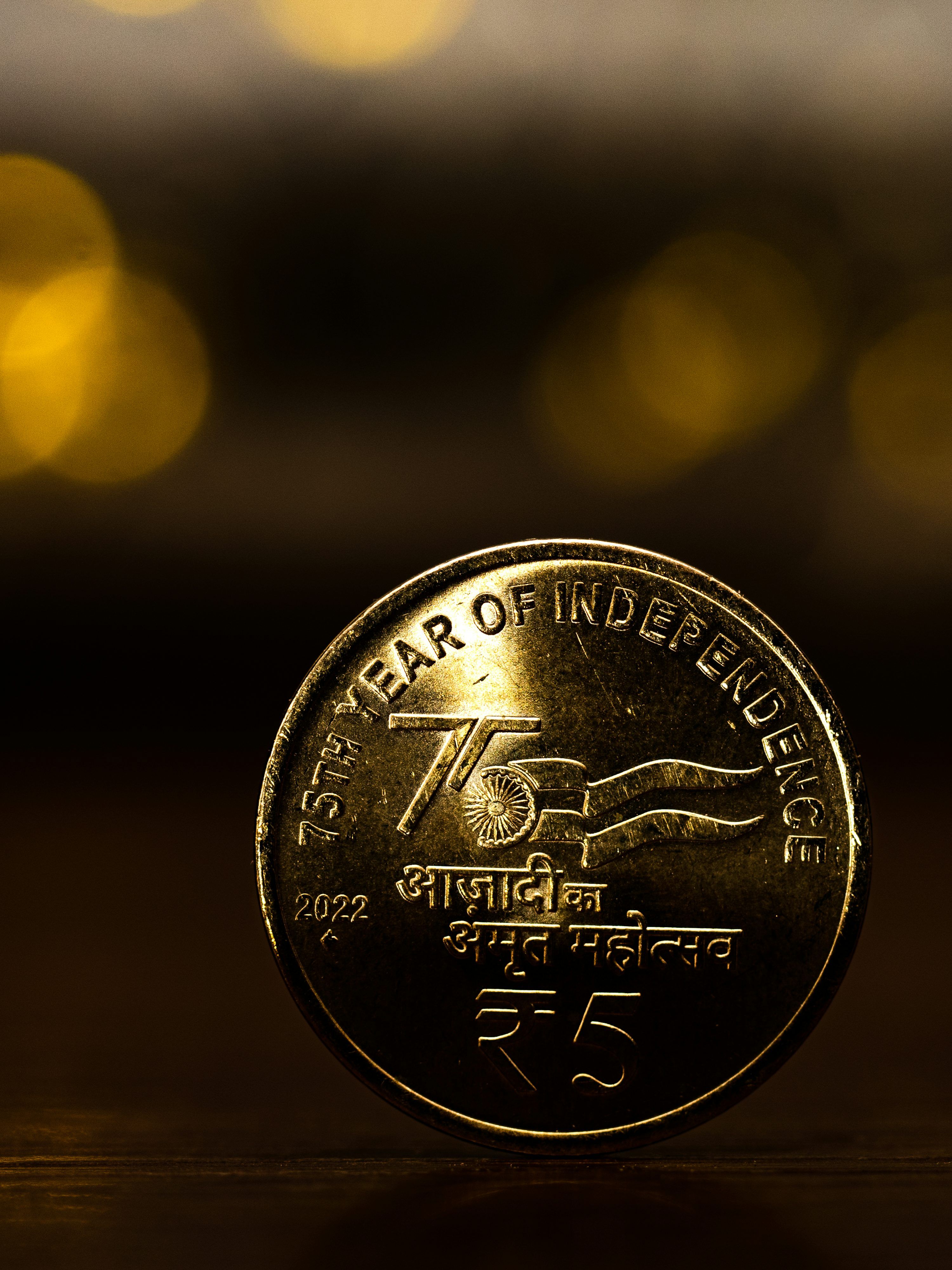 3000x4000 A coin with a face on it photo