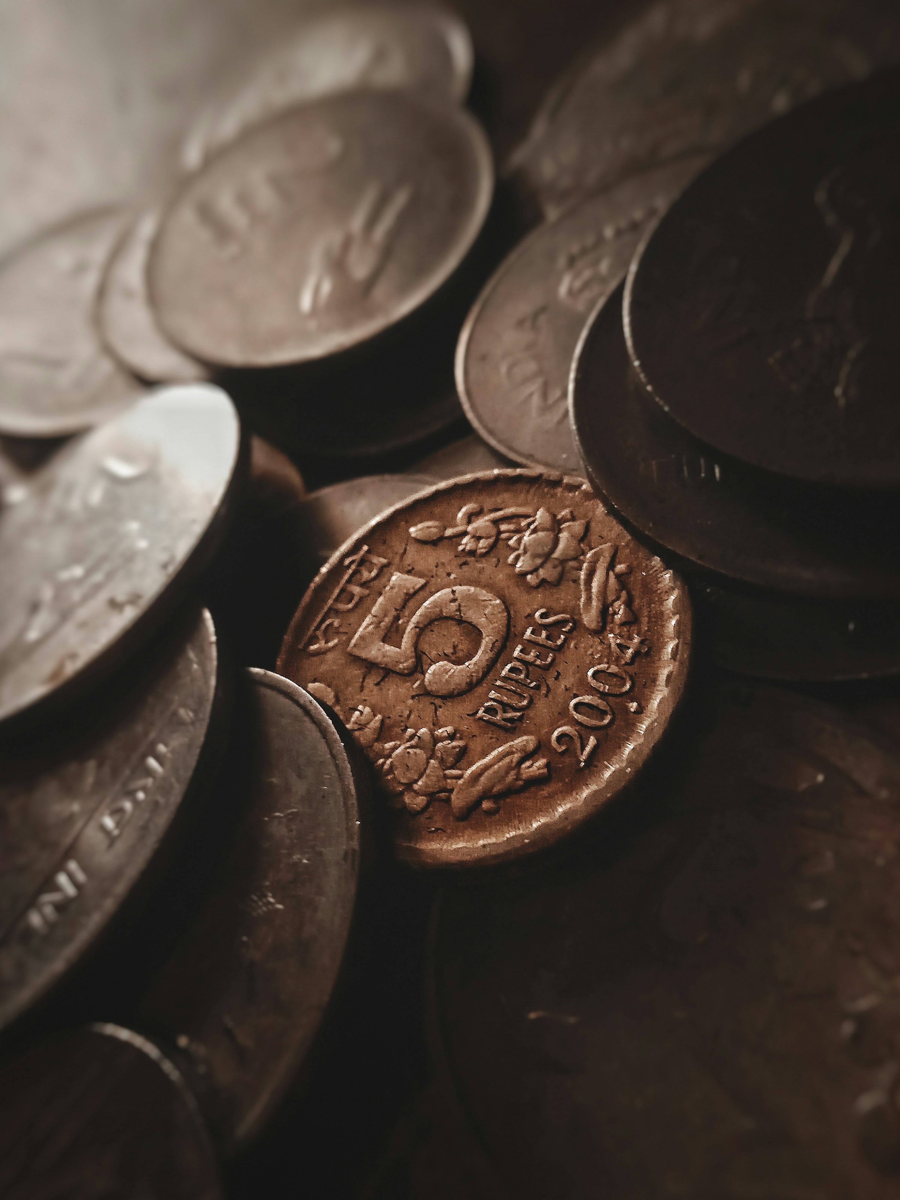 3000x4000 Silver round coins on black surface photo