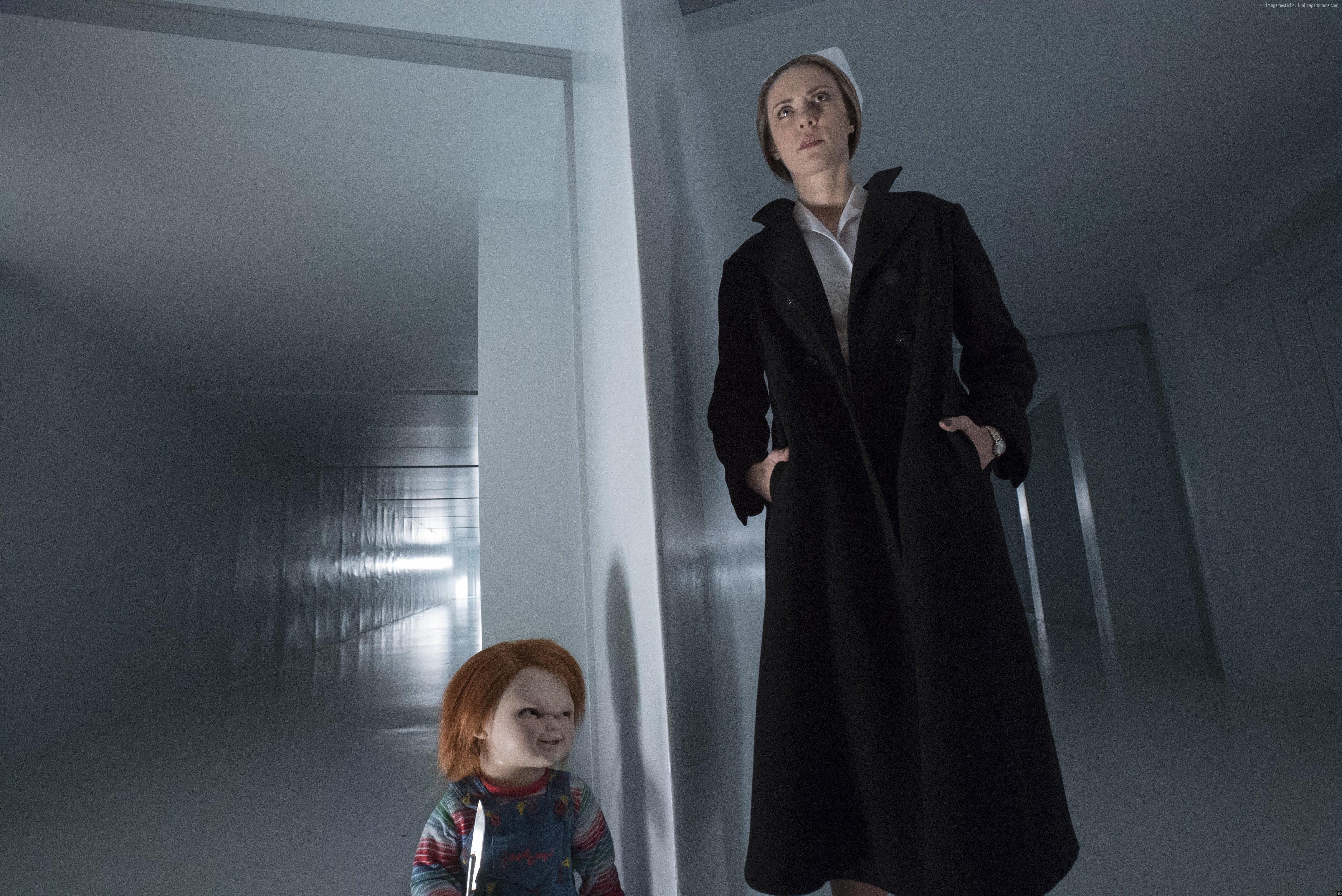 4240x2832 Chuckie Doll beside woman in black coat HD wallpaper