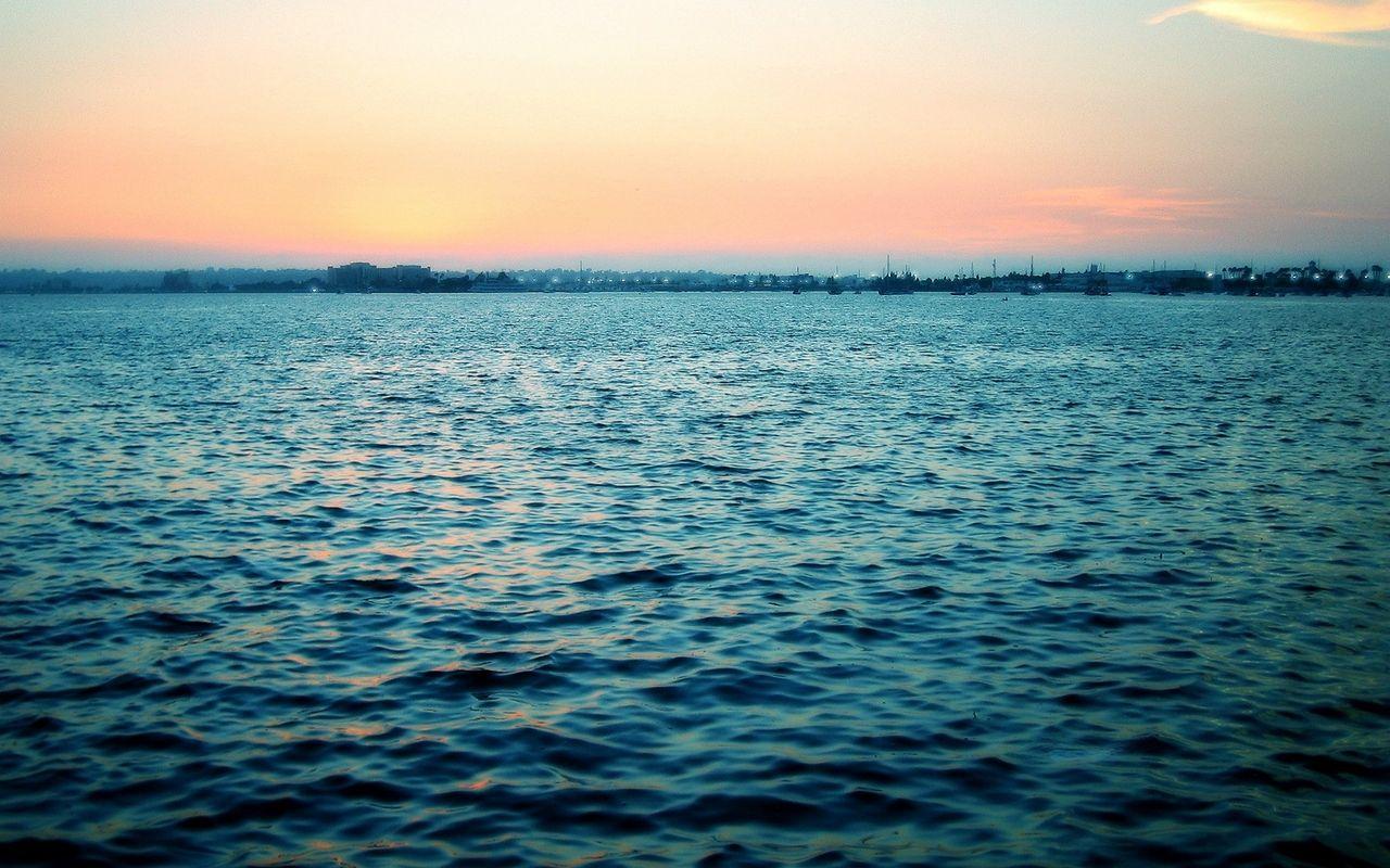 1280x800 Download wallpaper 1280x800 sea, calm, water table, ripples