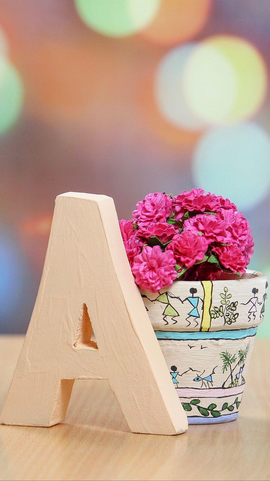938x1668 Wallpaper Vase, Letter, Flowers, Glare A Wallpaper With