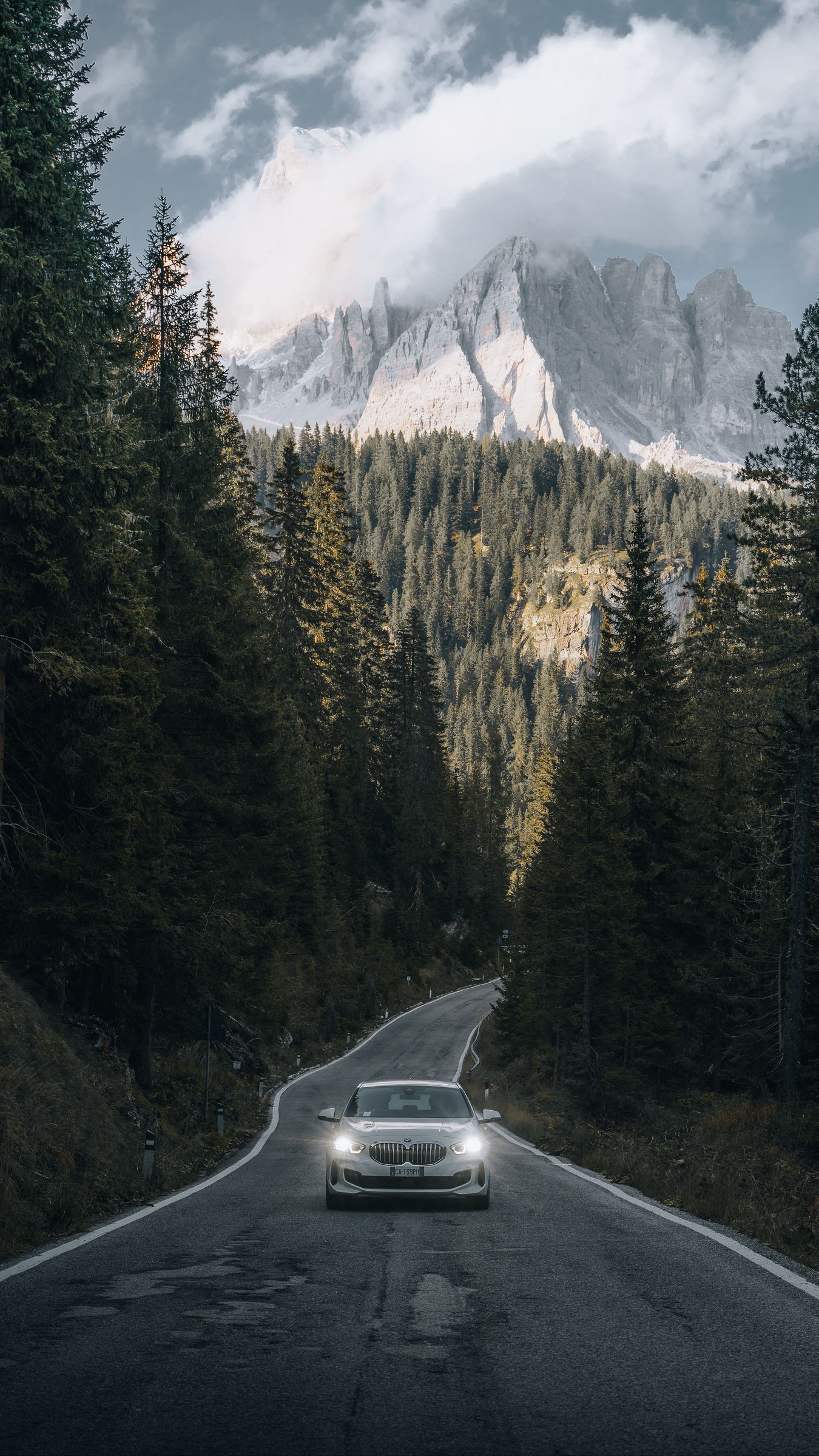 1350x2400 Download wallpaper 1350x2400 car, road, mountains, forest, nature iphone 8+/7+/6s+/for parallax HD background