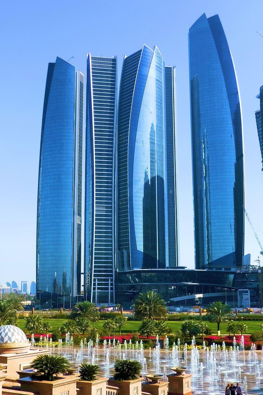 910x1365 HD Wallpaper: Four City High Rise Buildings, Etihad Towers, Abu