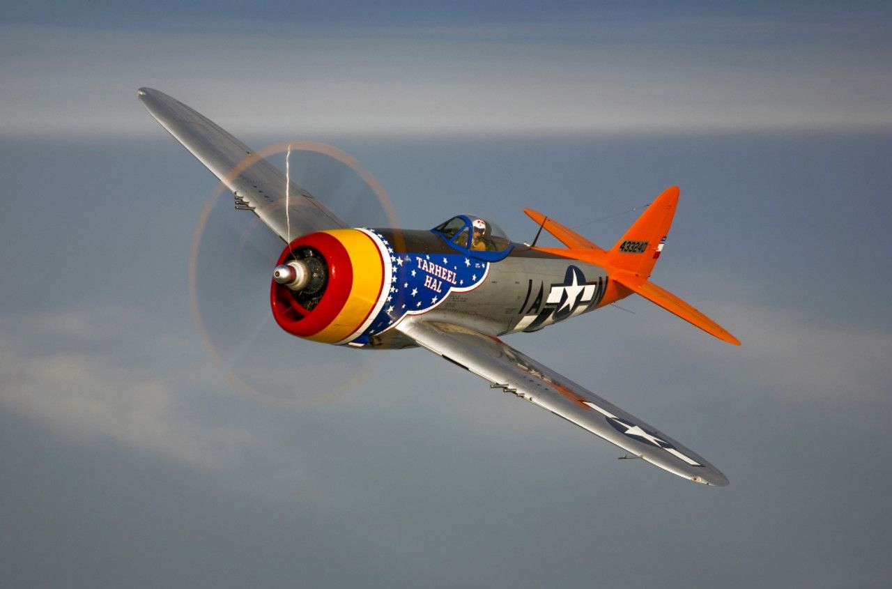 1280x845 A Republic P 47D Thunderbolt In Flight Over Galveston, Texas Poster Print # VARPSTSGR100014M