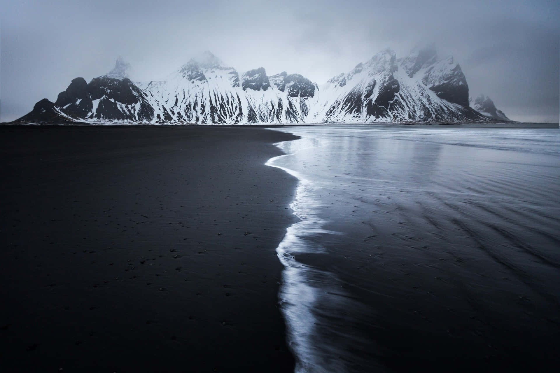 1920x1280 Download Take a break from reality and enjoy the beauty of nature at this breathtaking black sand beach Wallpaper