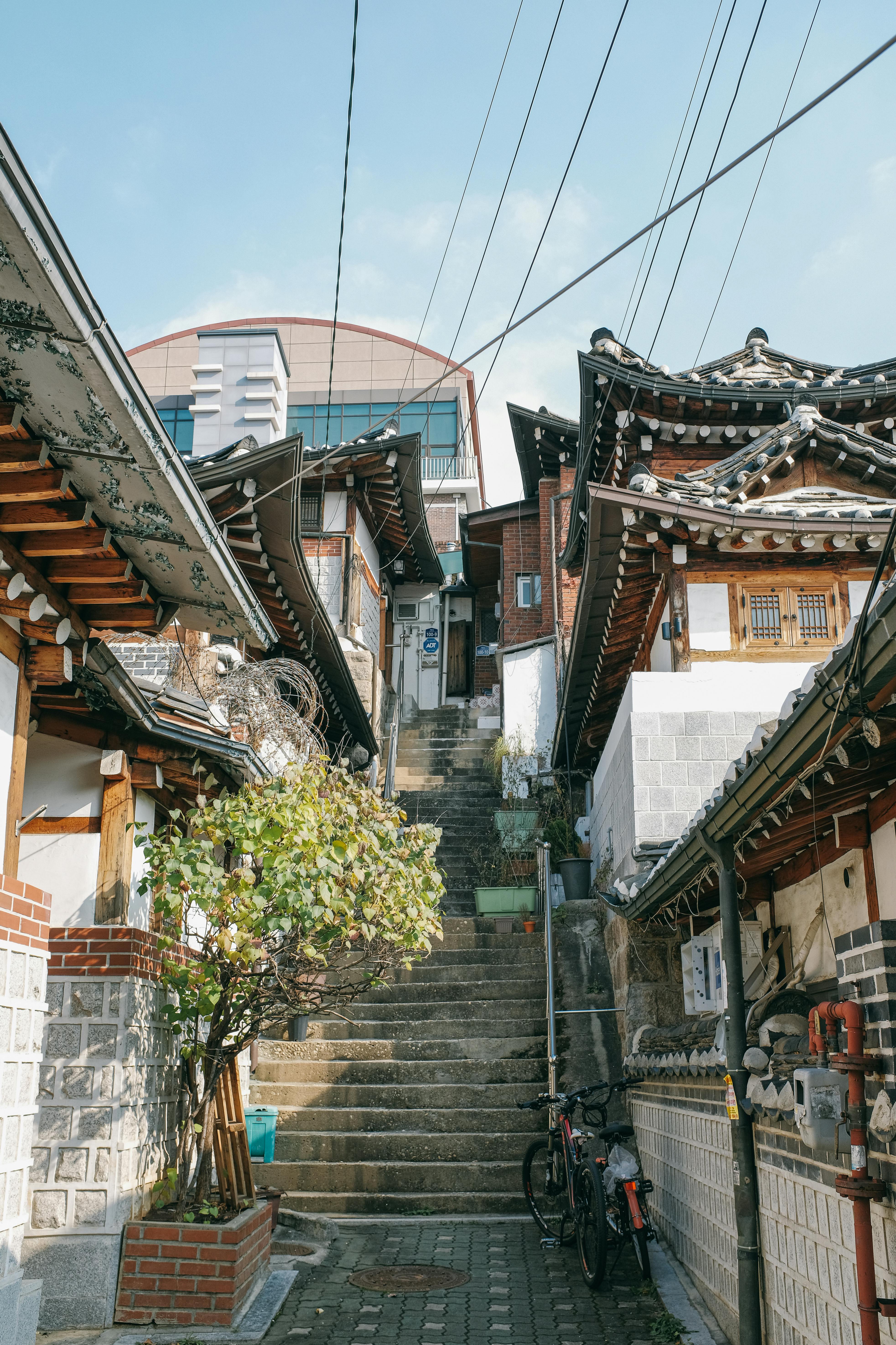 3929x5894 Stairs between Buildings in Bukchon Hanok Village in Seoul, South Korea · Free