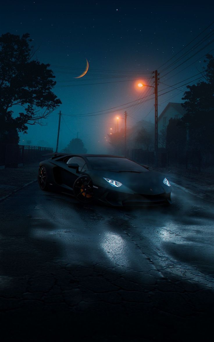 736x1177 Moonlit Drive: Black Sports Car in the Night