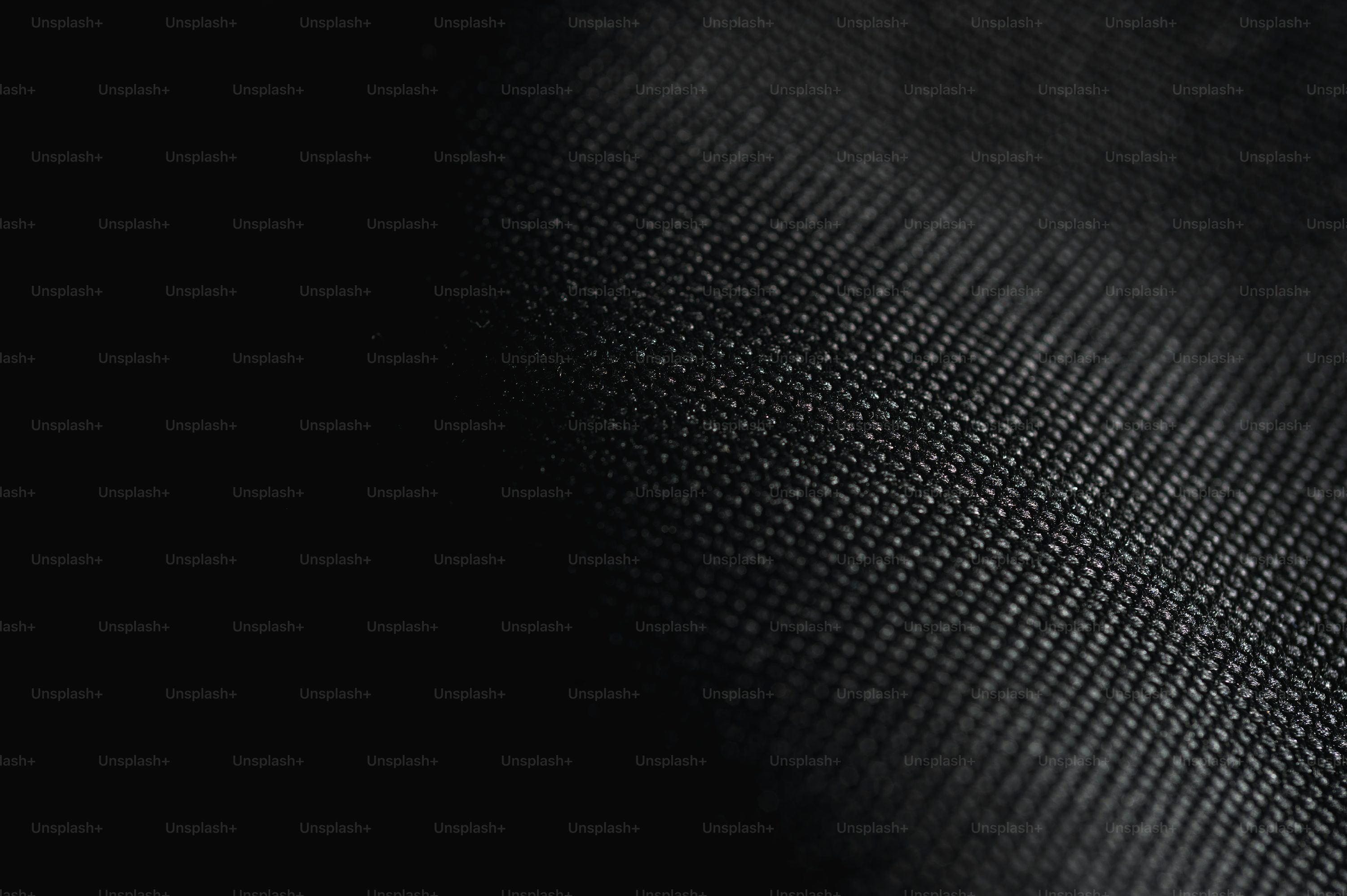 3000x1996 Close Up Of Dark Textured Fabric With Soft Lighting Photo
