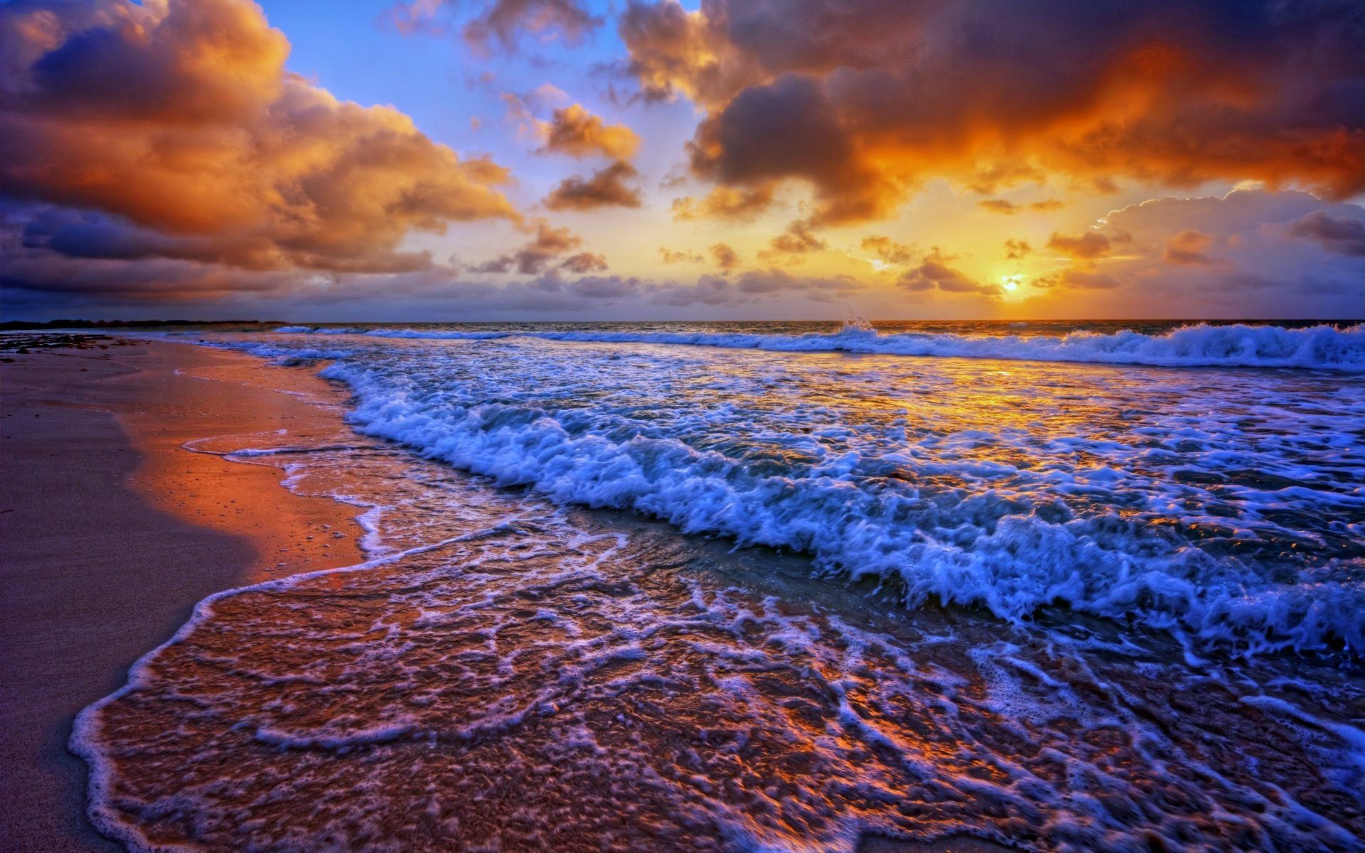 1920x1200 Stunning Sunset Waves: 4K Ultra HD Ocean Beach Wallpaperx2400