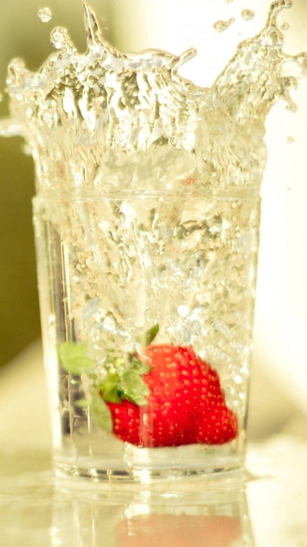 1080x1920 Strawberry Falling In Glass Of Water Android Wallpaper free download