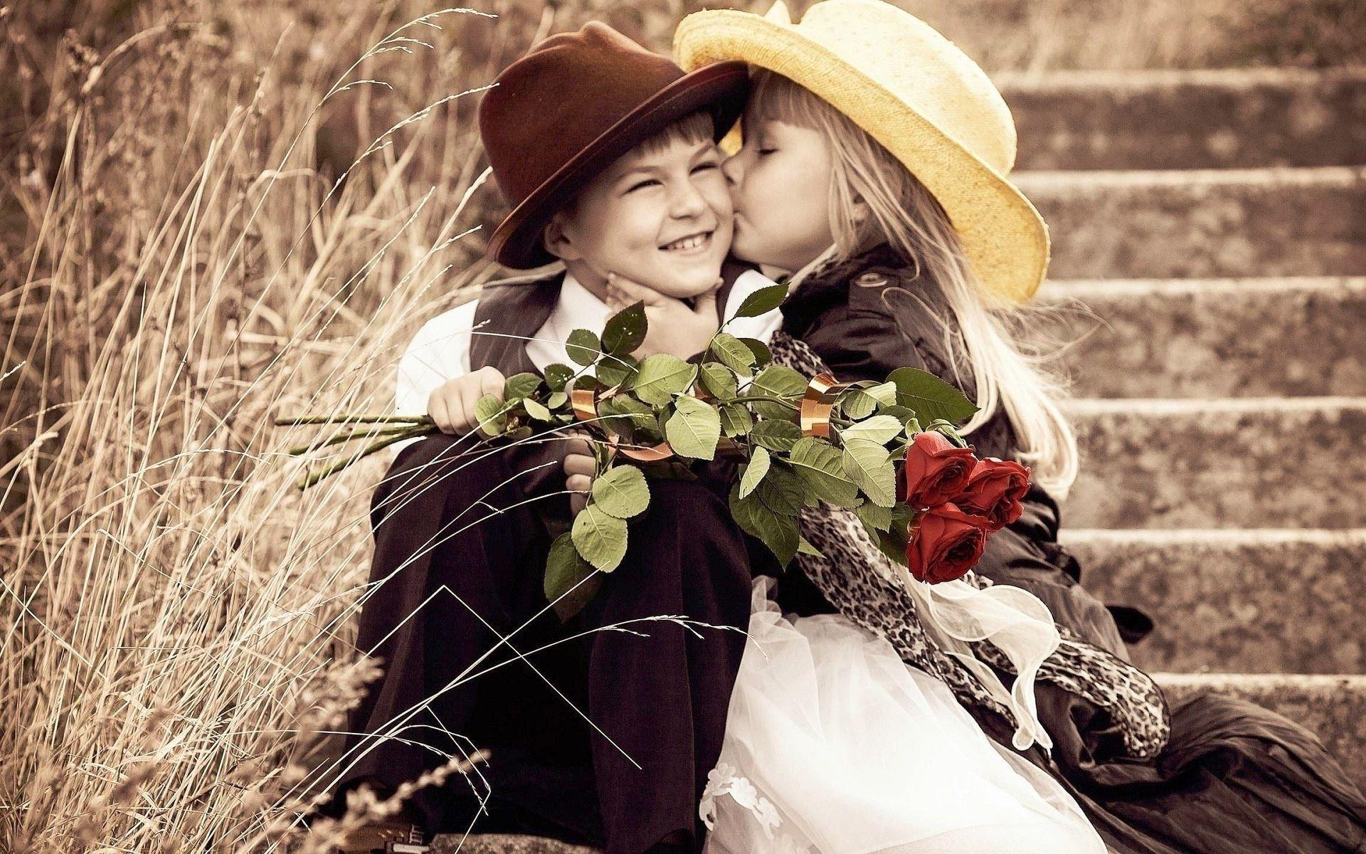 1920x1200 Small girl gives beautiful kiss to cute boy nice couple. Kids