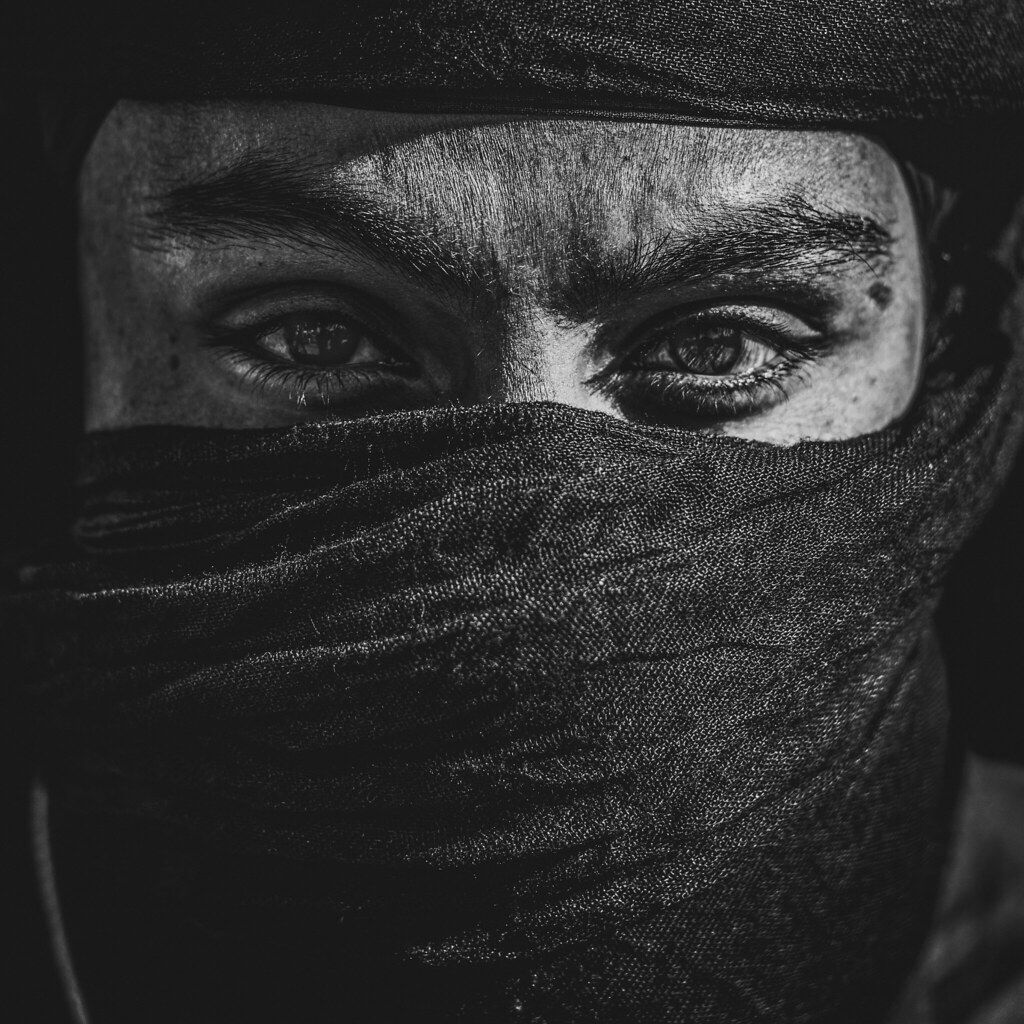 1024x1024 Nihang Singh. A Nihang Singh looks towards me as I take his