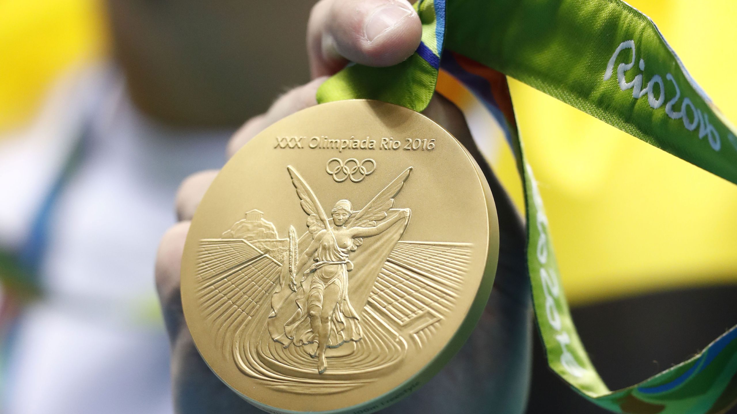 2560x1440 How Much Money Olympic Medalists Can Make