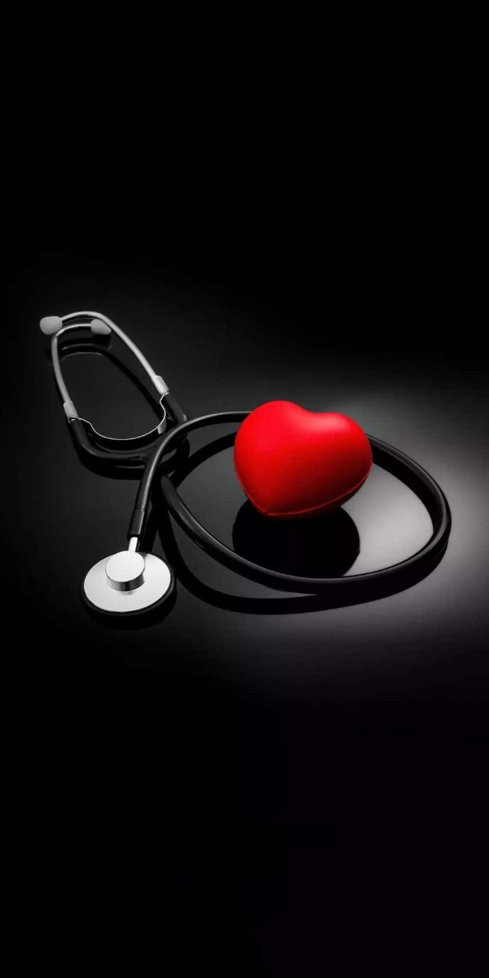 960x1920 Download A Stethoscope And A Red Heart On A Black Background