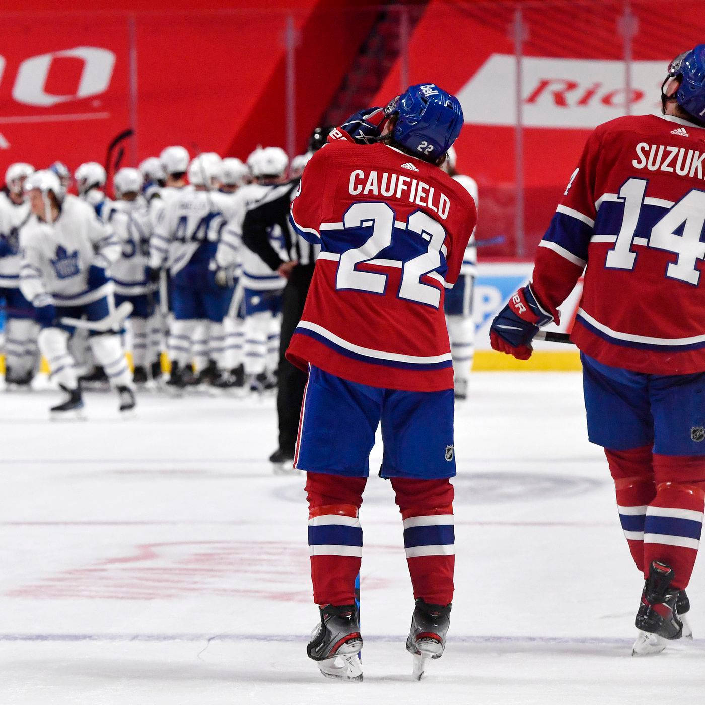 1400x1400 Download Nick Suzuki And Cole Caufield Against Toronto Maple Leafs Wallpaper