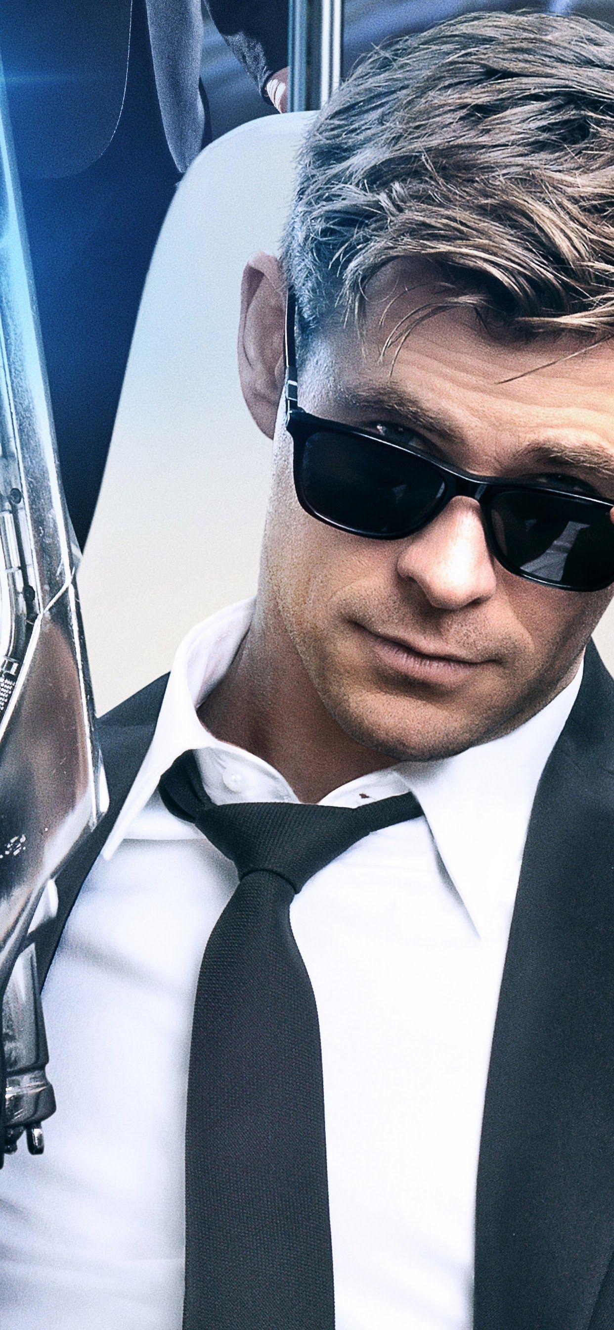 1242x2688 Men in Black: International Agent H Chris Hemsworth 4K Wallpaper