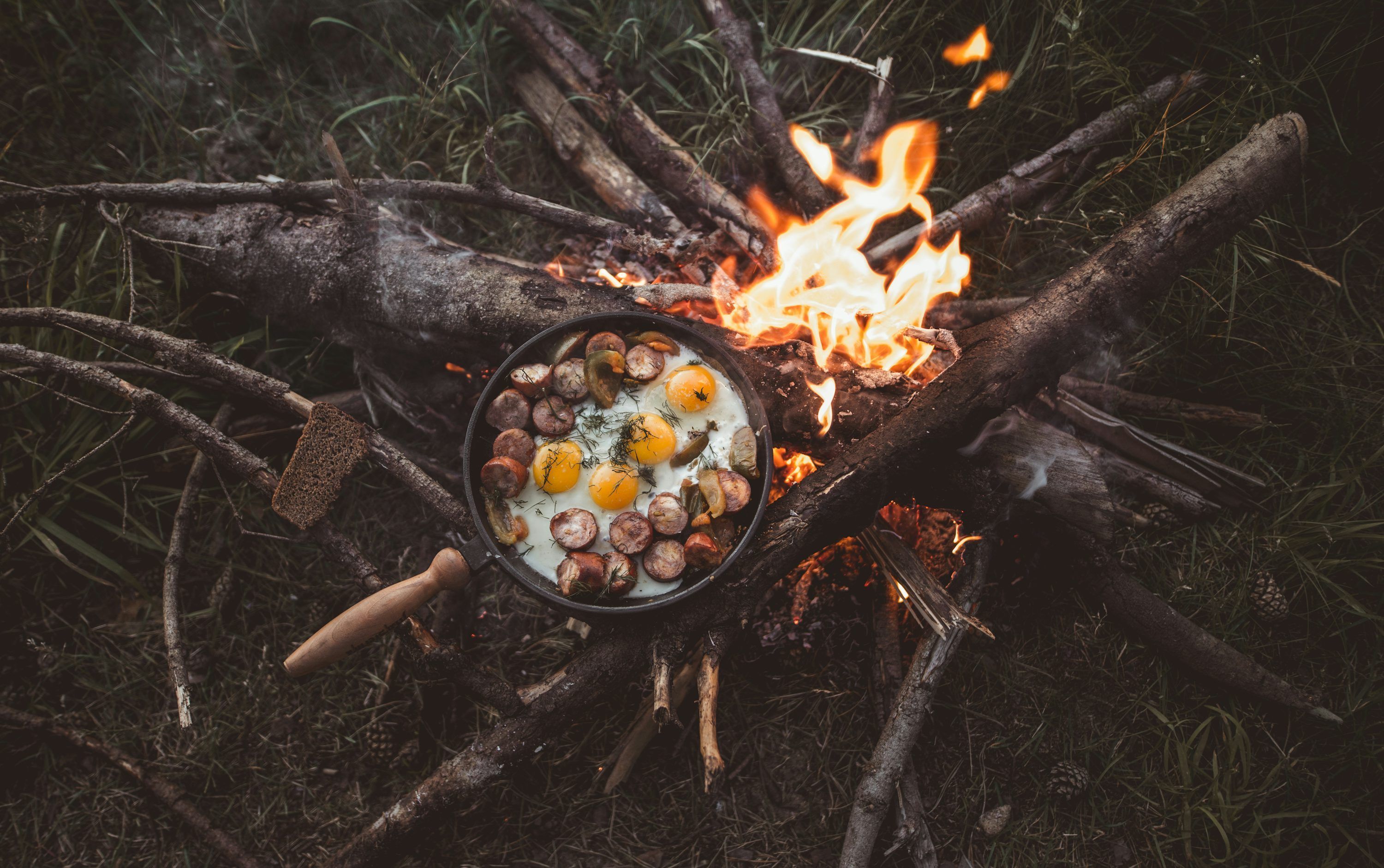 3000x1881 Food cooking on black pot photo