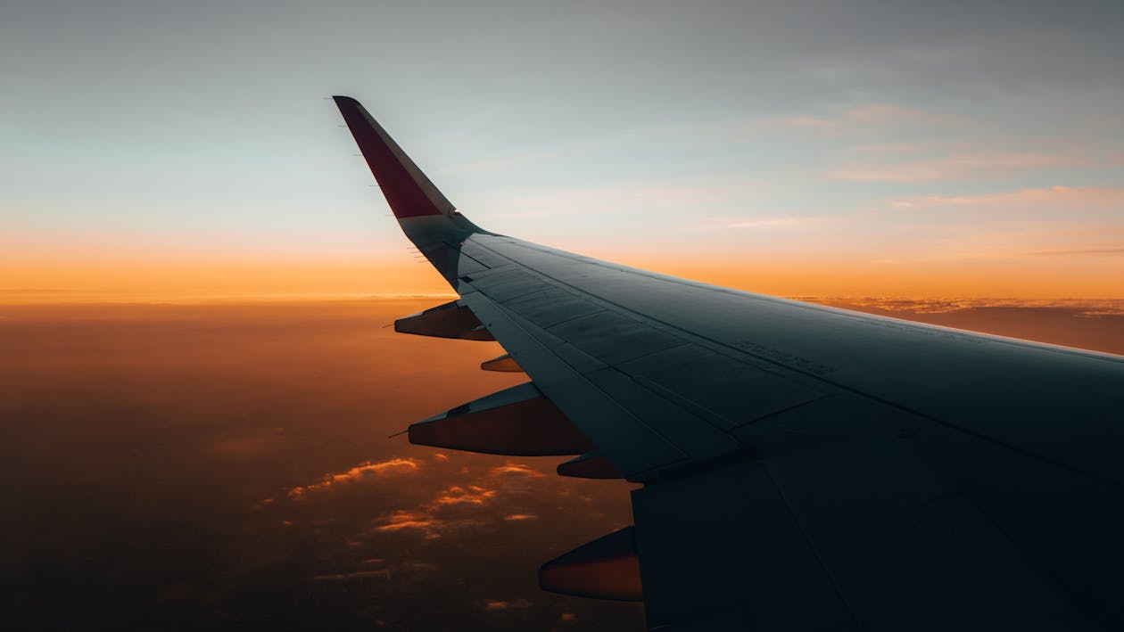 1260x709 View from an Airplane Window at Dawn · Free