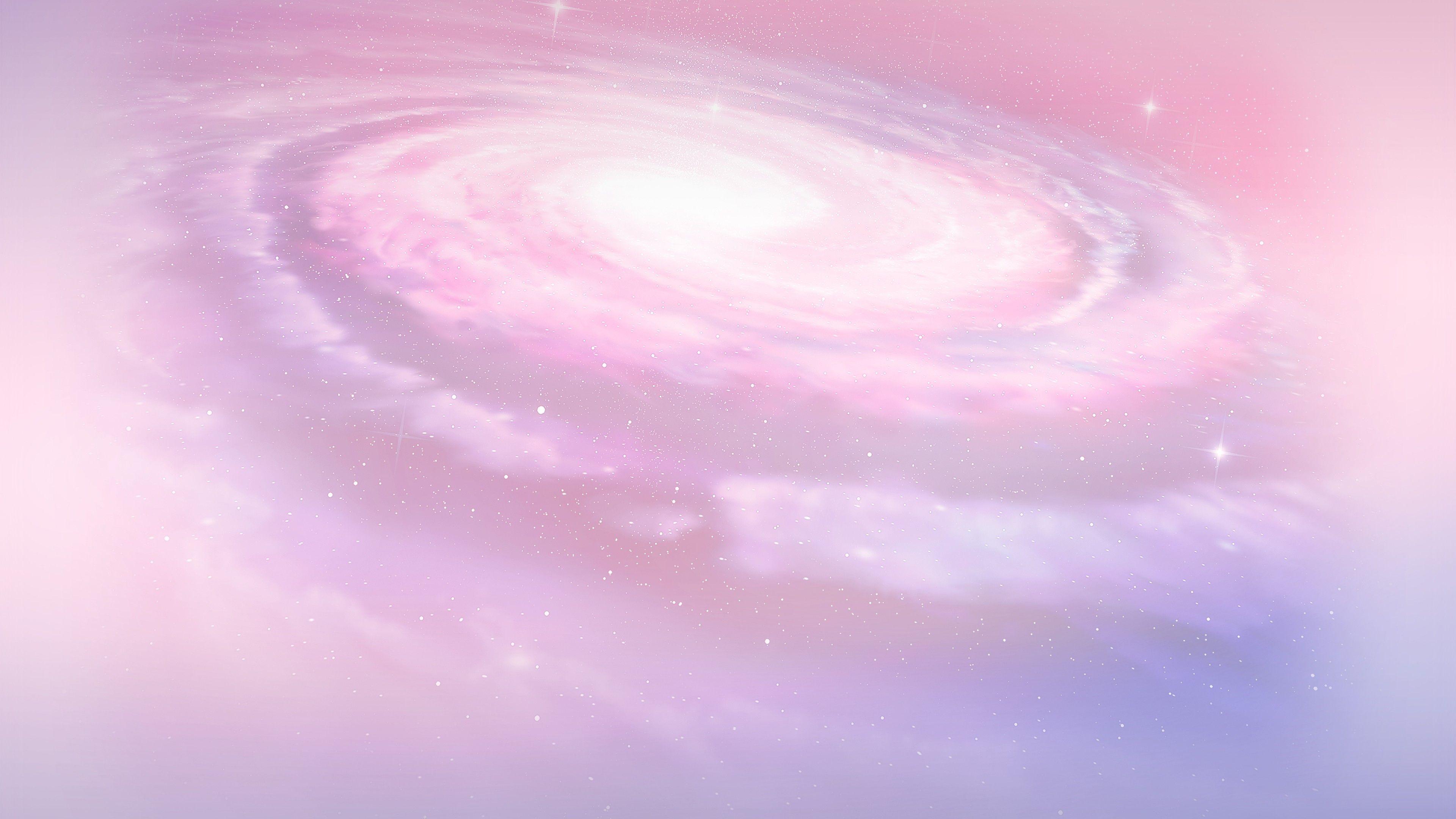 Sắc hồng nhạt của ngân hà khiến cho nó trở nên tinh tế và bề ngoài đẹp mắt hơn bao giờ hết. Hãy ngắm nhìn bức ảnh nền ngân hà mang màu sắc hồng nhạt này, để cảm nhận được tình cảm mềm mại và lãng mạn đến từ vũ trụ.