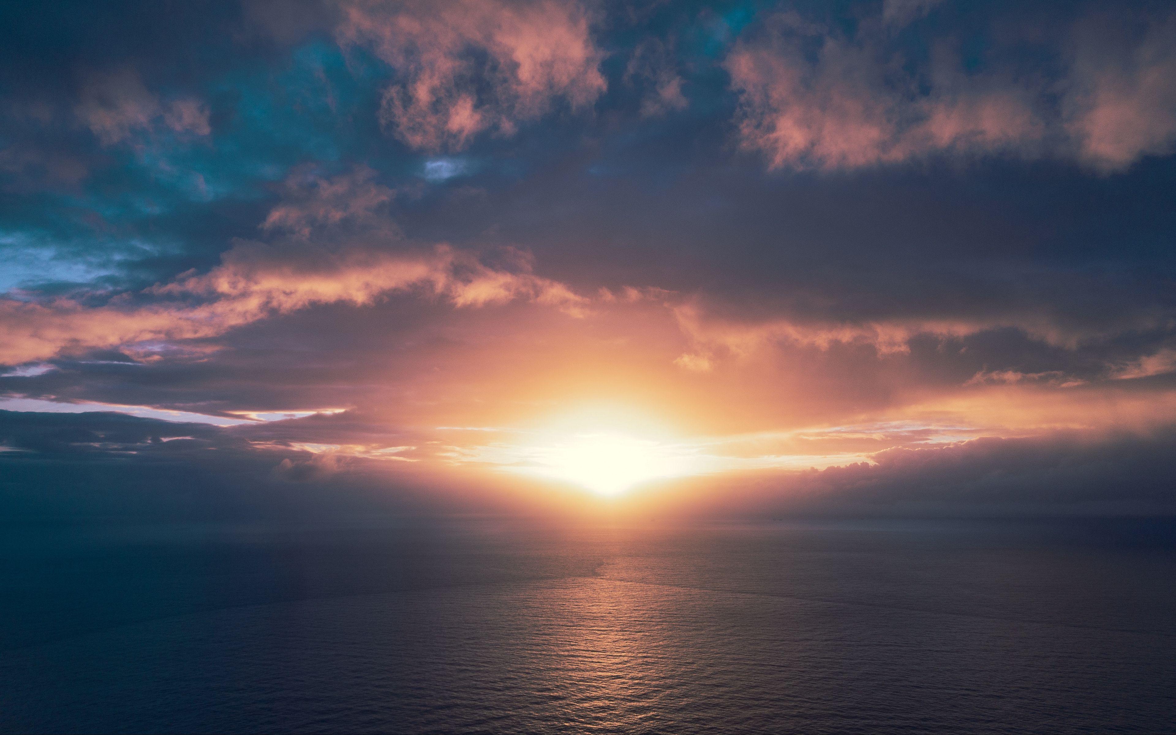 3840x2400 Download wallpaper 3840x2400 ocean, sunset, horizon, sky, clouds