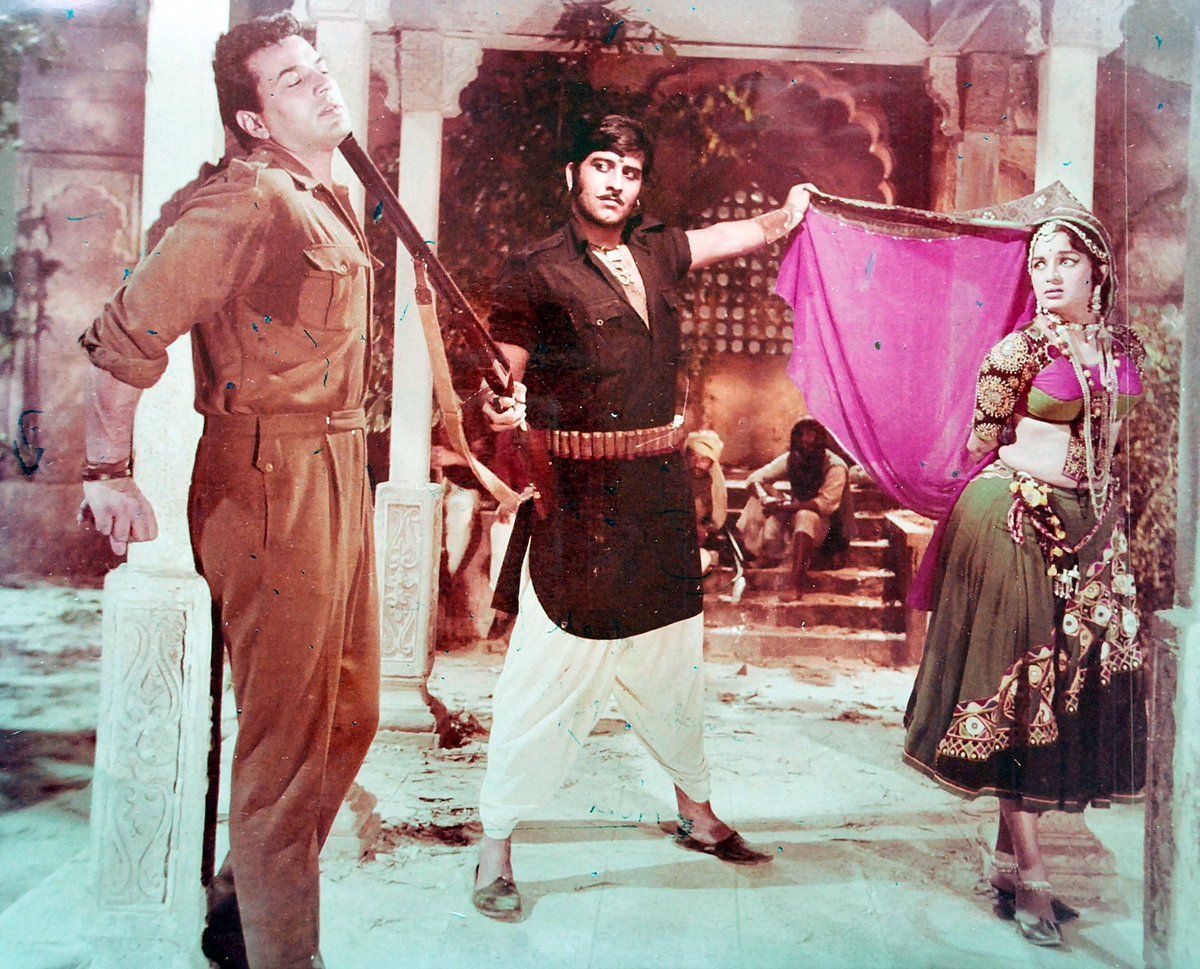 1200x969 1971) Vinod Khanna, Asha Parekh & Dharmendra in a scene from the film 'Mera Gaon Mera Desh'