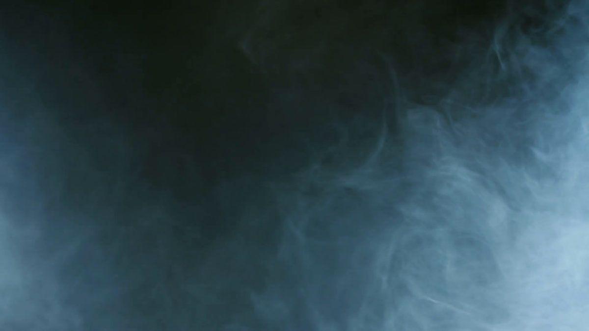 1200x675 Subscription Library Blue smoke on black background. Cigarette