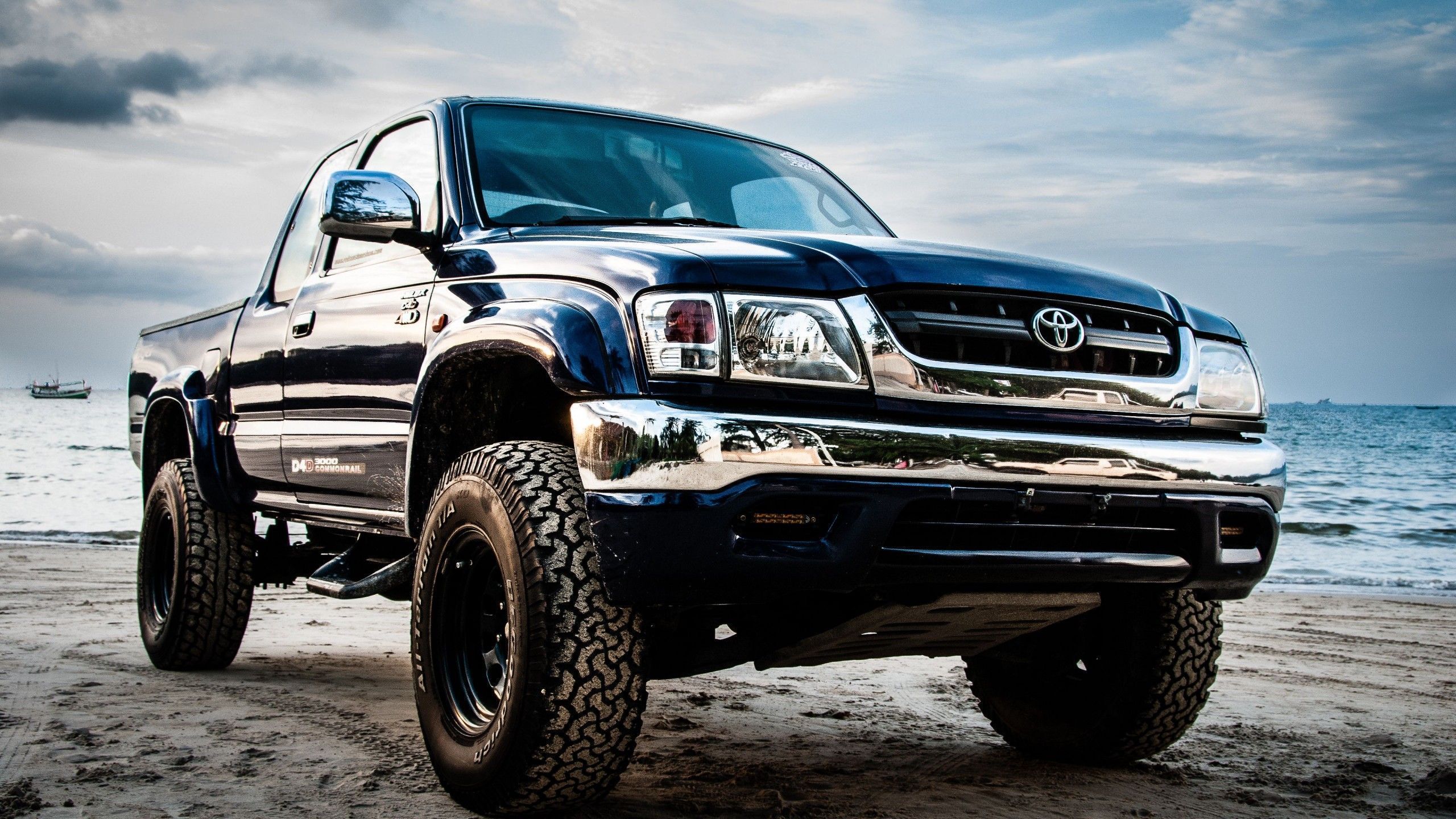 2560x1440 Toyota Hilux Toyota Car Ocean Background 4K HD Cars Wallpaper