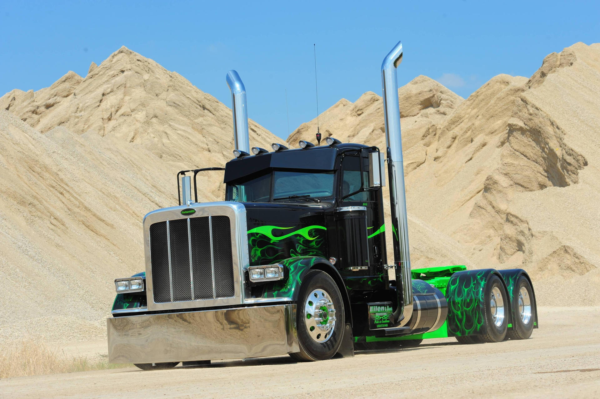 1920x1278 Download Powerful Peterbilt trucks ready to transport goods Wallpaper