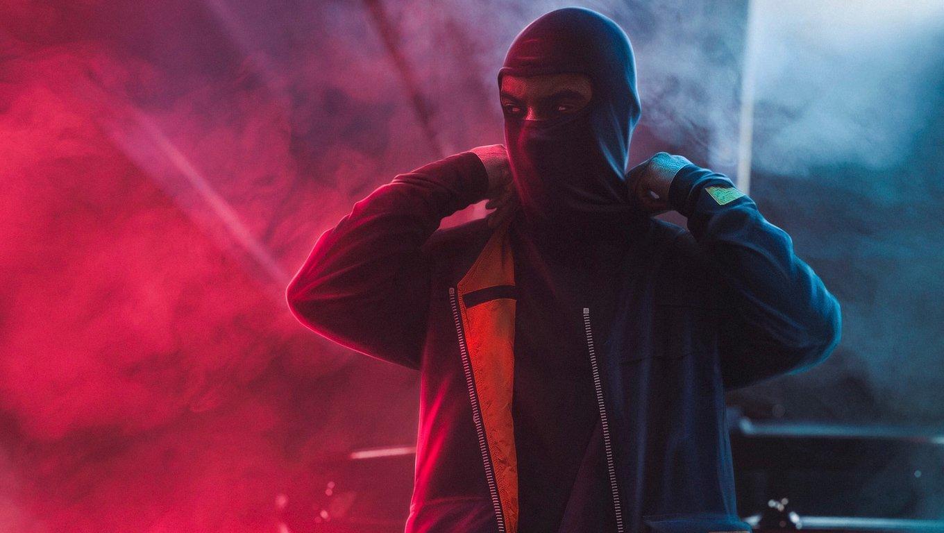 1360x768 Mask Man Red Smoke HD Wallpaper (1360x768)