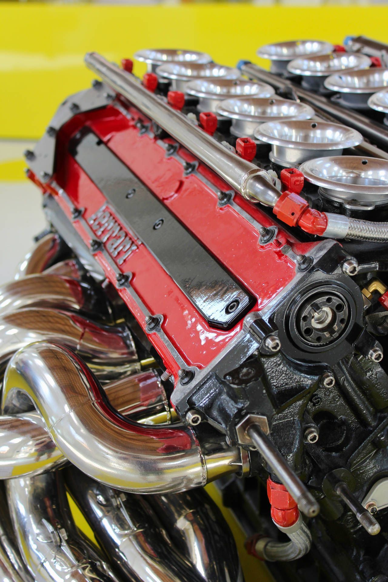 1280x1920 Download Red and silver Ferrari engine Wallpaper