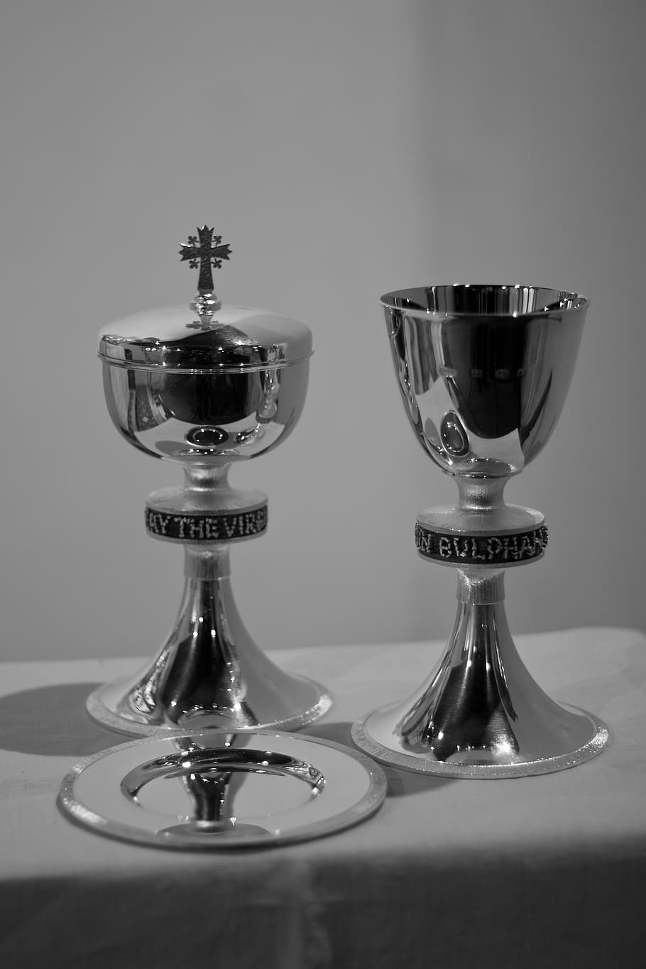 910x1365 HD wallpaper: two silver chalices on table, sacrament, communion silver, ciborium