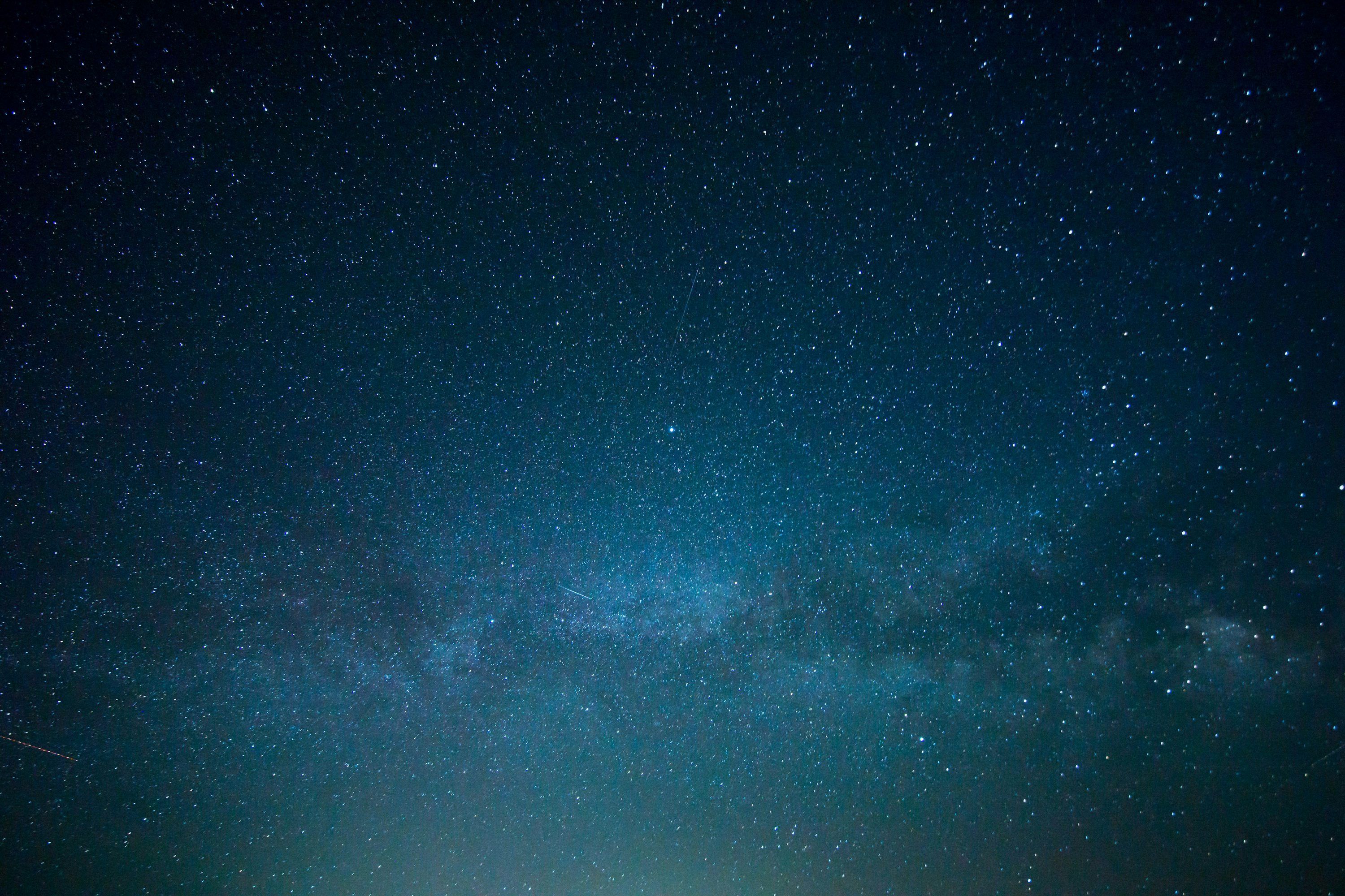 3000x2000 The night sky is filled with stars and bright lights photo