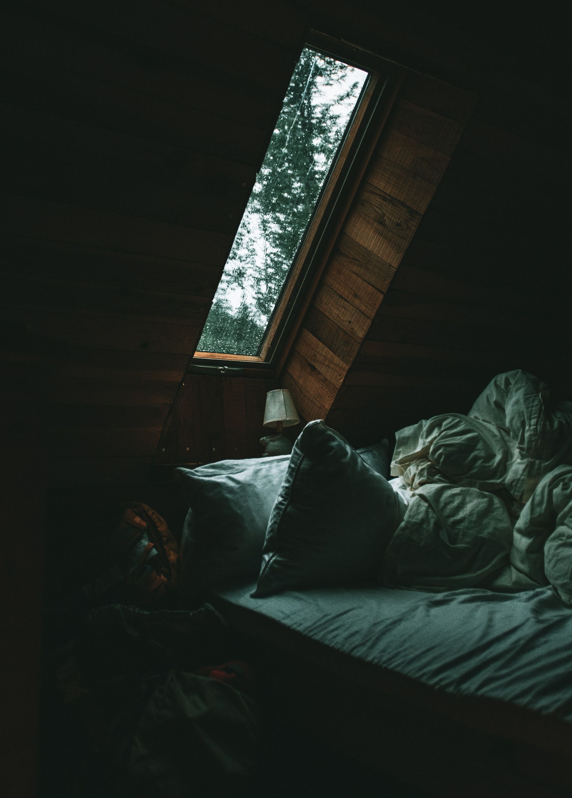 2400x3346 Download wallpaper 2400x3346 room, bed, pillow, window, dark HD background
