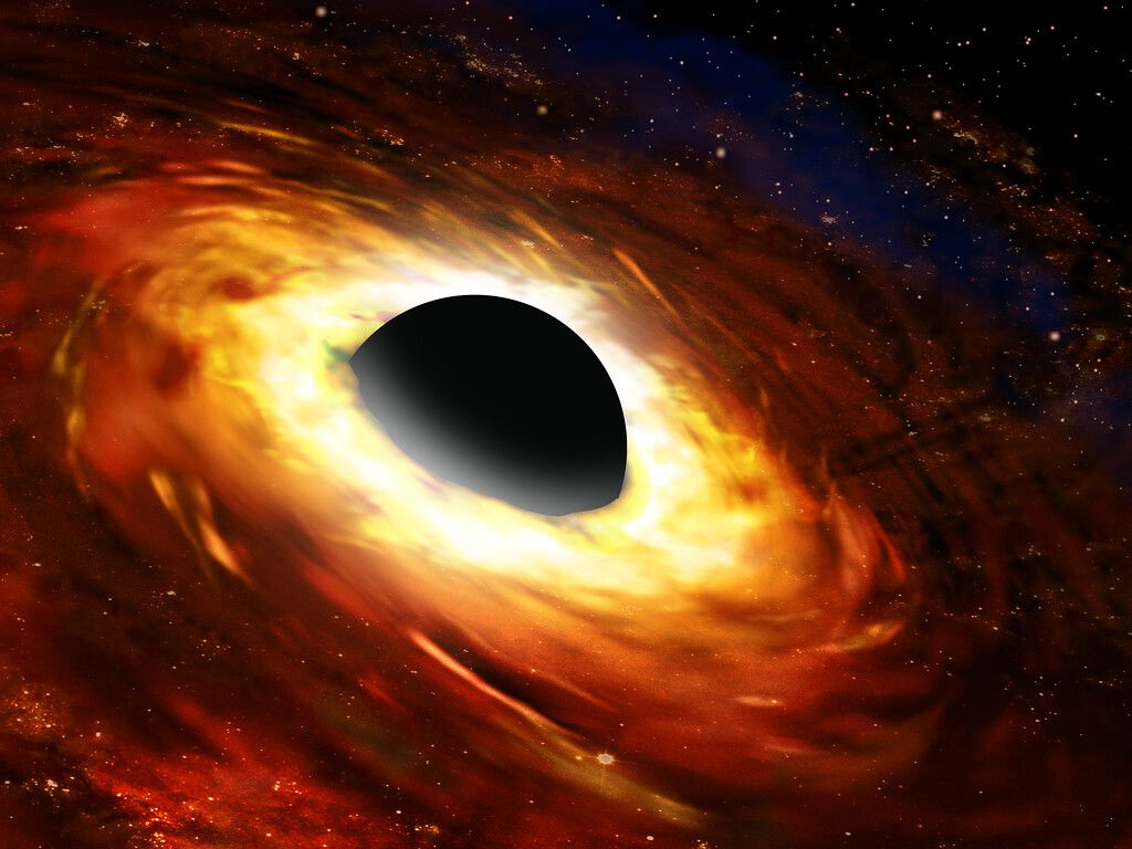 1024x768 Artist's impression of a black hole and accretion disk