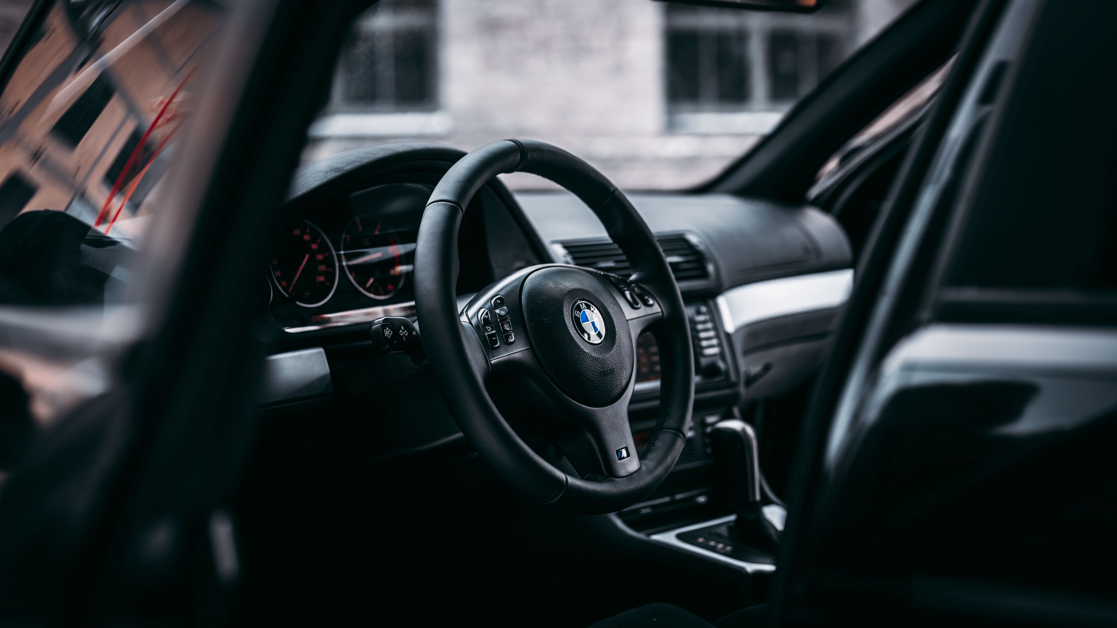 3840x2160 Download wallpaper 3840x2160 bmw, steering wheel, car, car interior 4k uhd 16:9 HD background