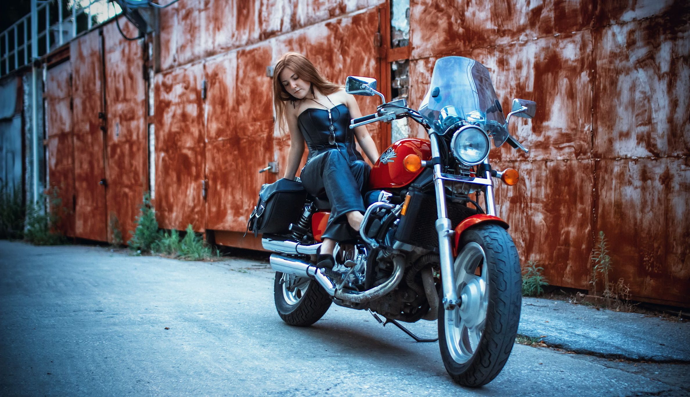 2377x1368 Wallpaper Woman in Black Tank Top Riding on Orange and Black Motorcycle During Daytime, Background Free Image