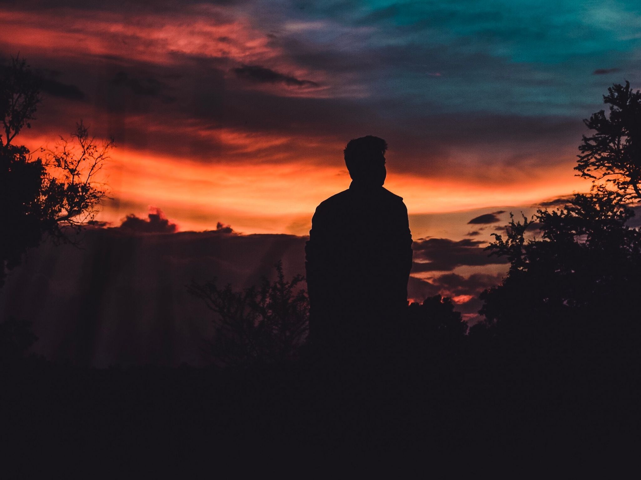 2048x1536 Wallpaper Silhouette of Man Standing on Grass Field During Sunset, Background Free Image
