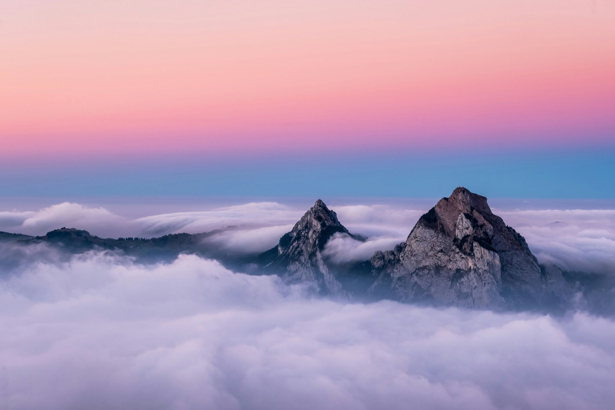 2500x1666 Colorful Sunrise Hues Over The Clouds With Mountaintop