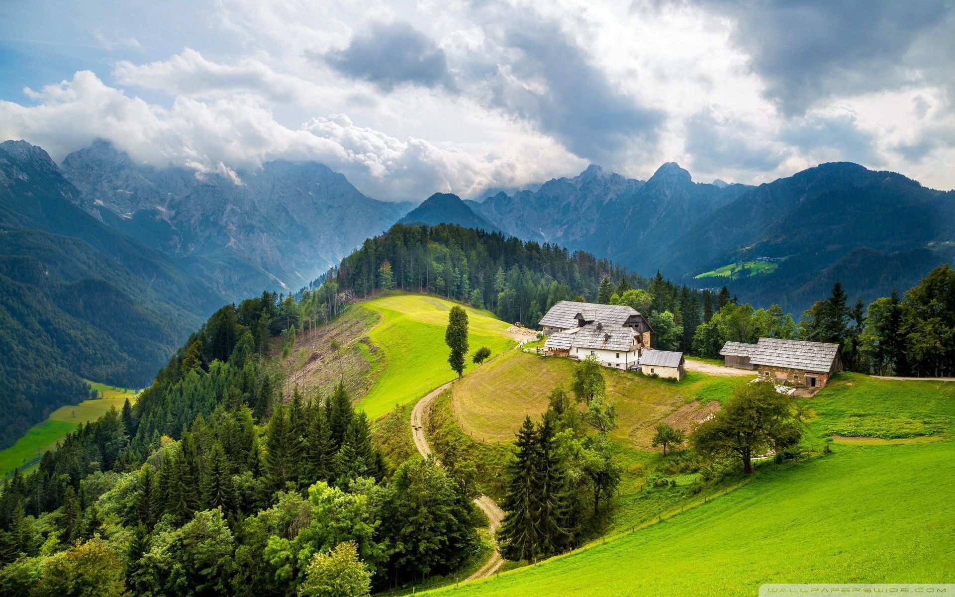 1920x1200 Houses On Hill Between Mountains 4K UHD Wallpaper for UltraHD Desktop and TV : Smartphone and Tablet Devices