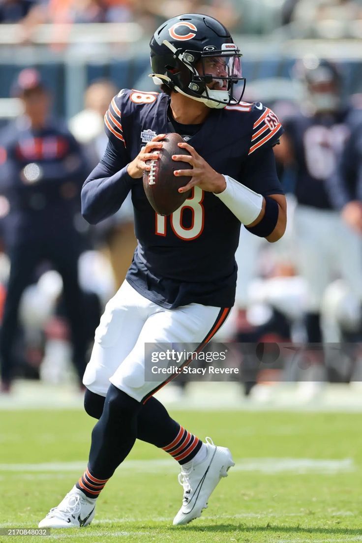 736x1104 Caleb Williams of the Chicago Bears looks to throw the ball during. Chicago bears, Nfl