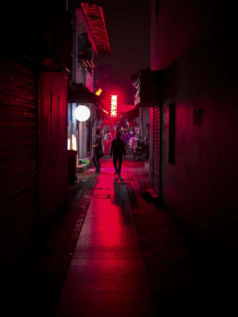769x1024 Download Vibrant nightlife at the Red Light District Wallpaper