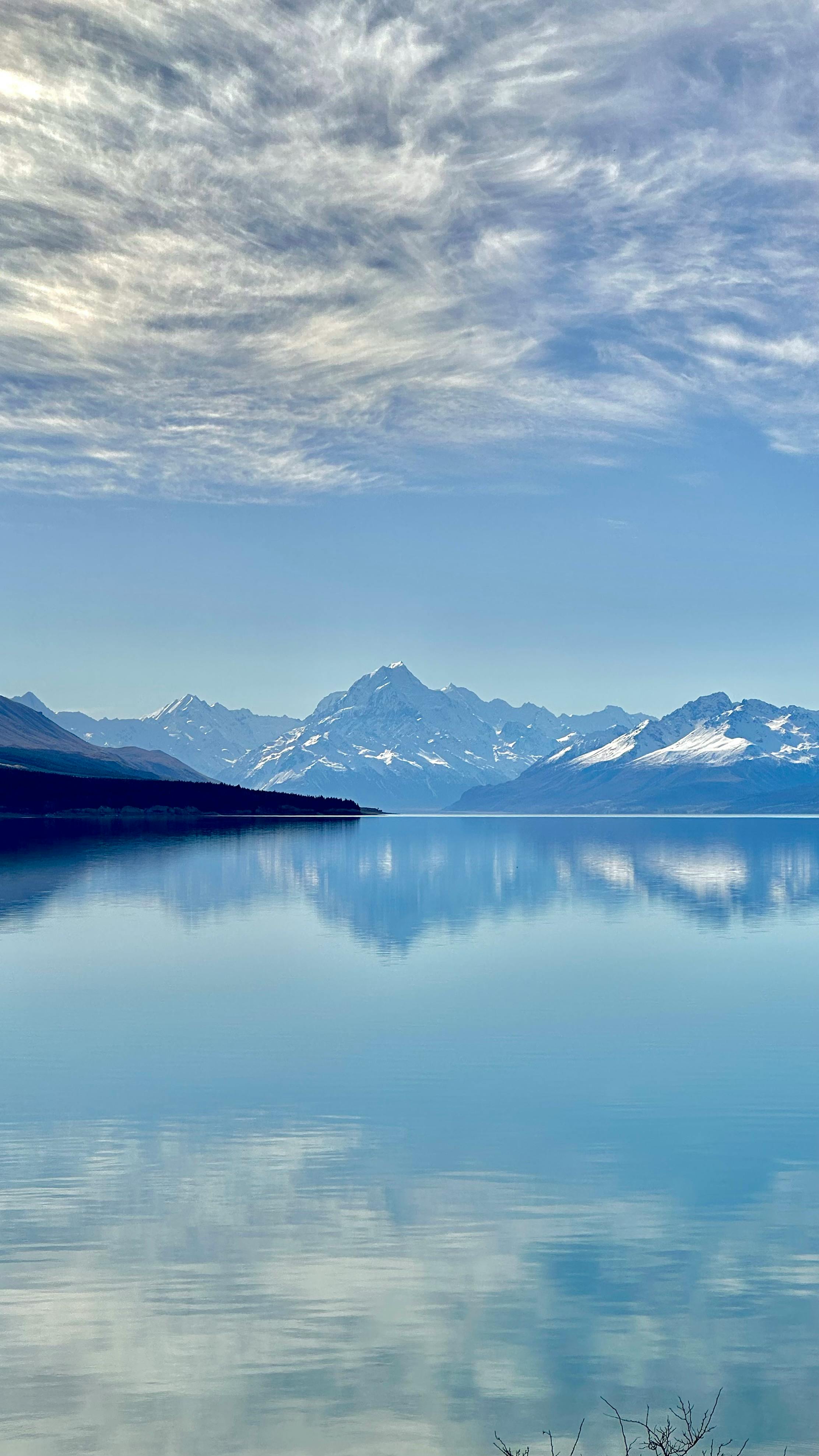 2224x3954 Sky Reflecting in a Placid Alpine Lake · Free