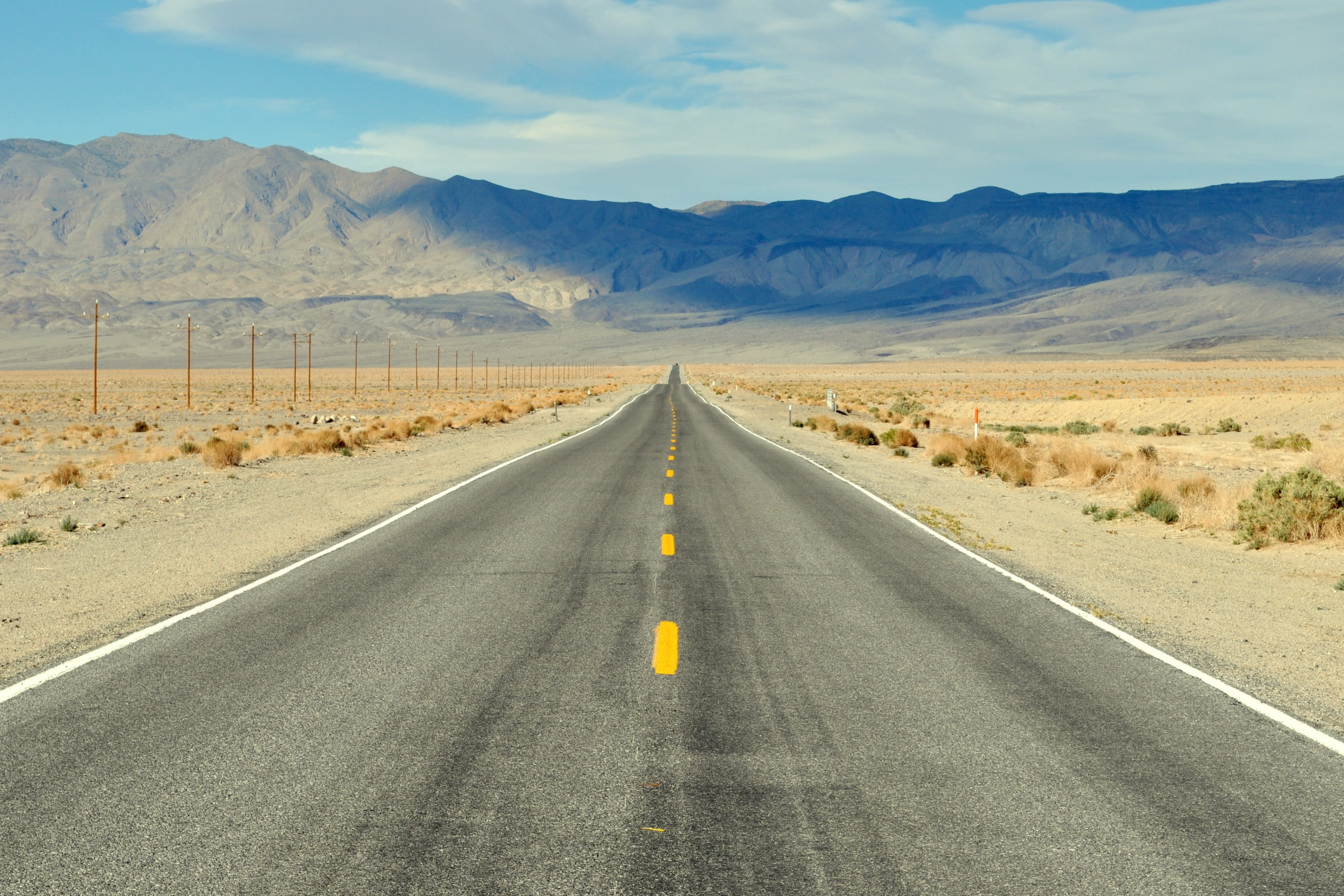 3000x2000 Royalty Free Photo: Straight Road Background Of Mountain