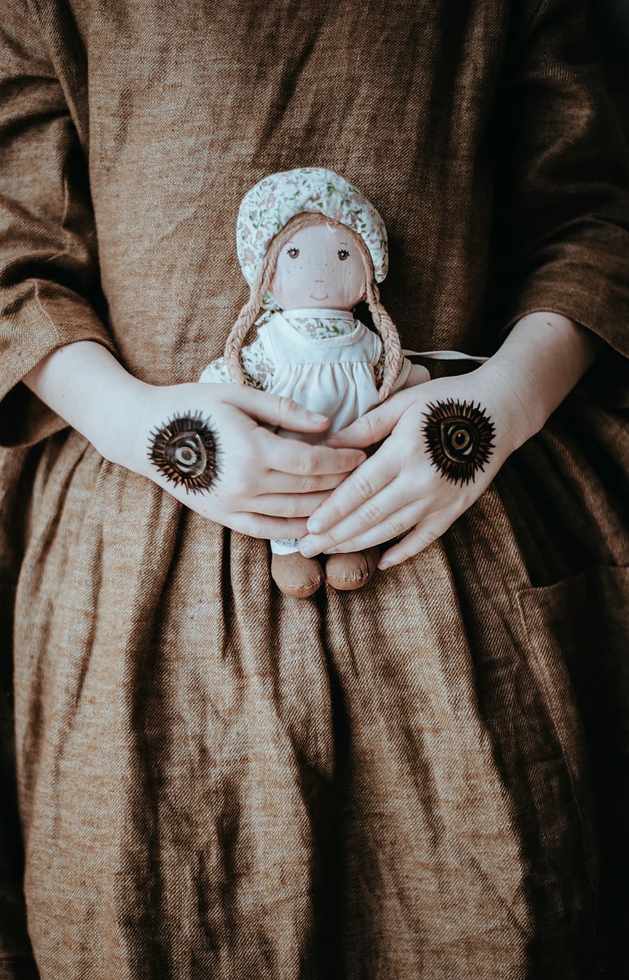 910x1418 HD wallpaper: person holding Voodoo doll, person holding doll