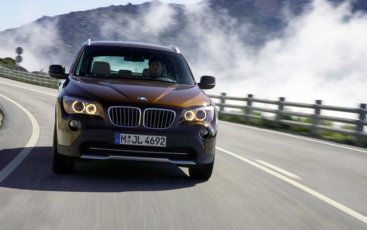 1280x804 BMW X1 Front Speed Brown wallpaper. BMW X1 Front Speed Brown